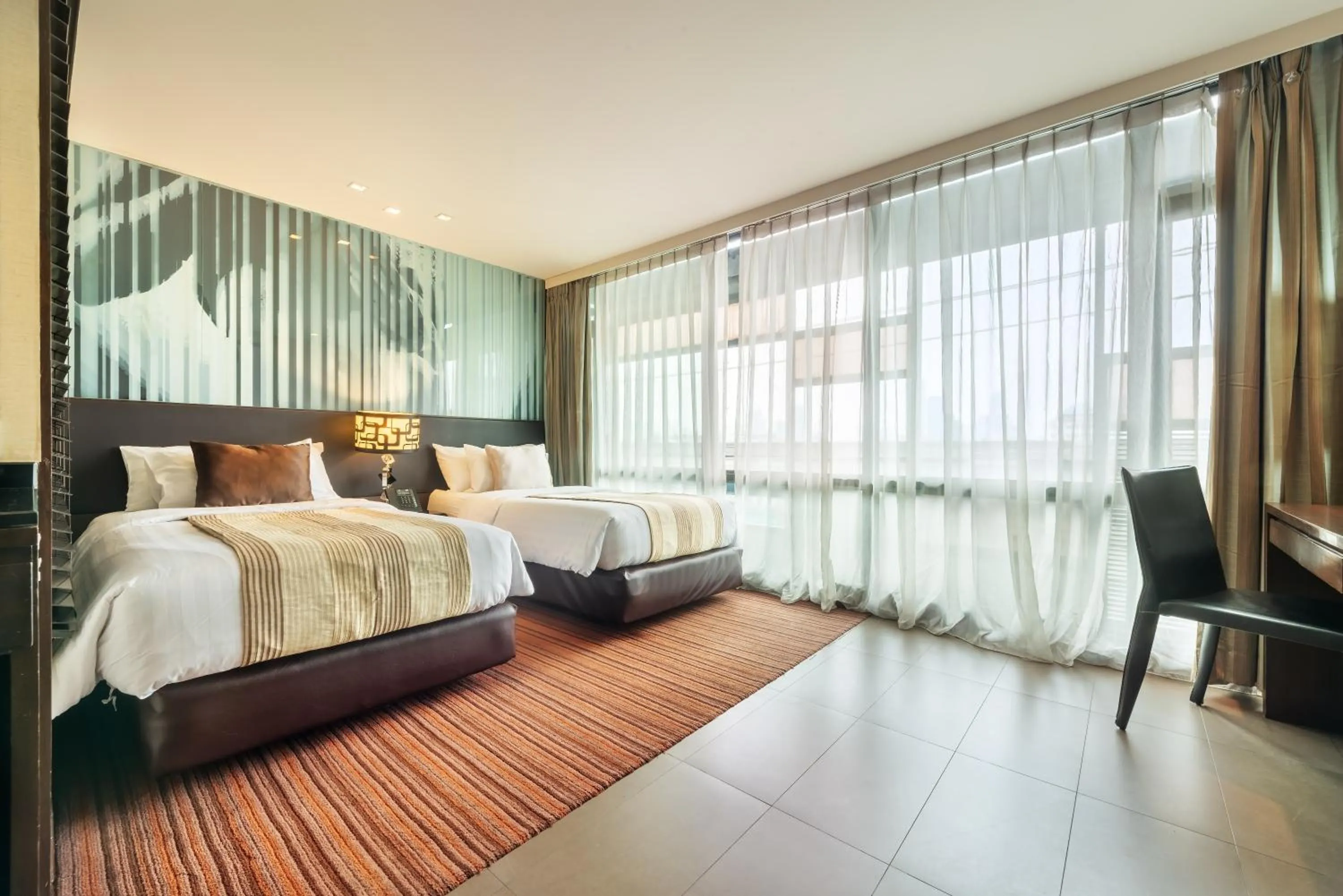 Bed in M2 de Bangkok Hotel