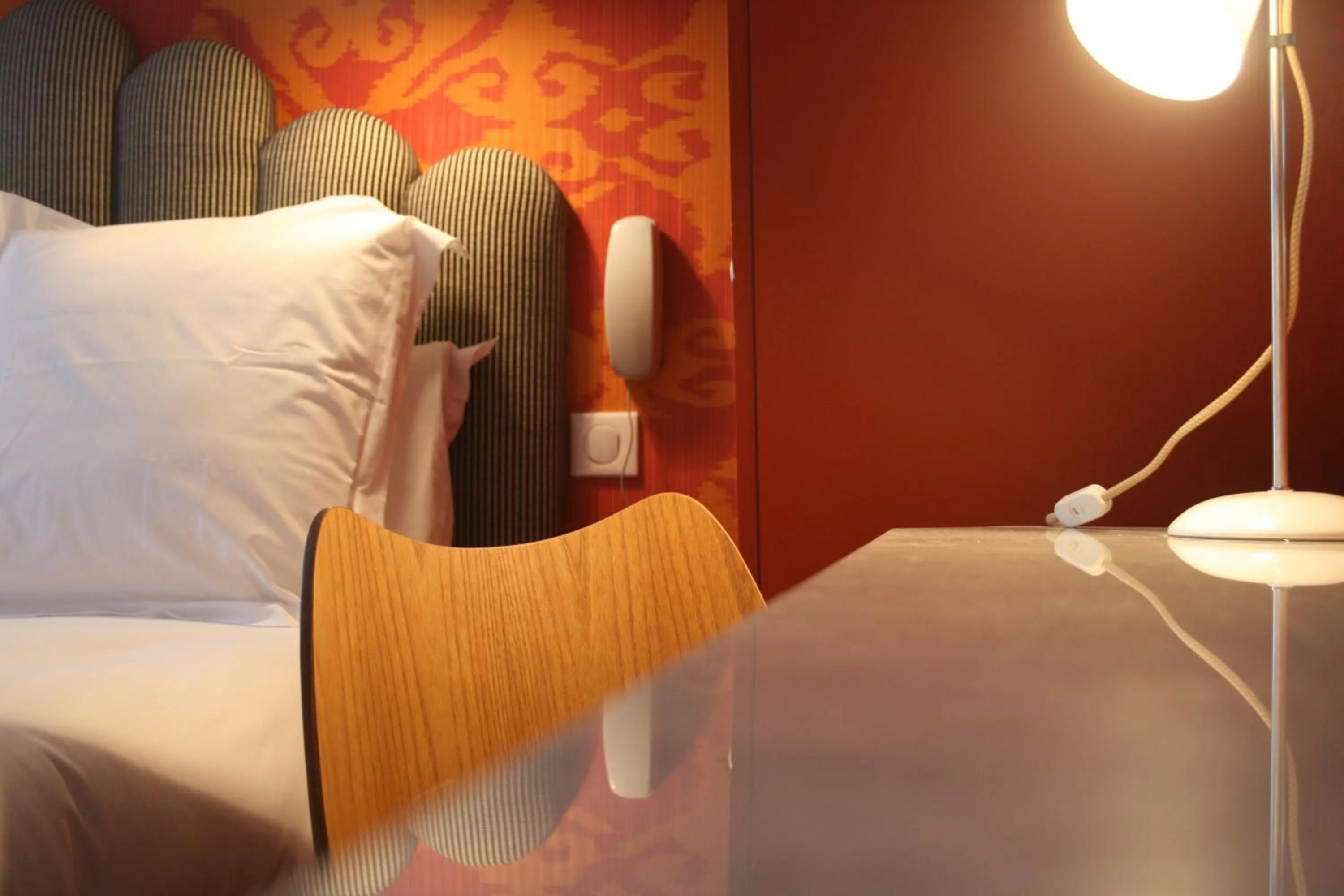 Bed in Hotel Paradis