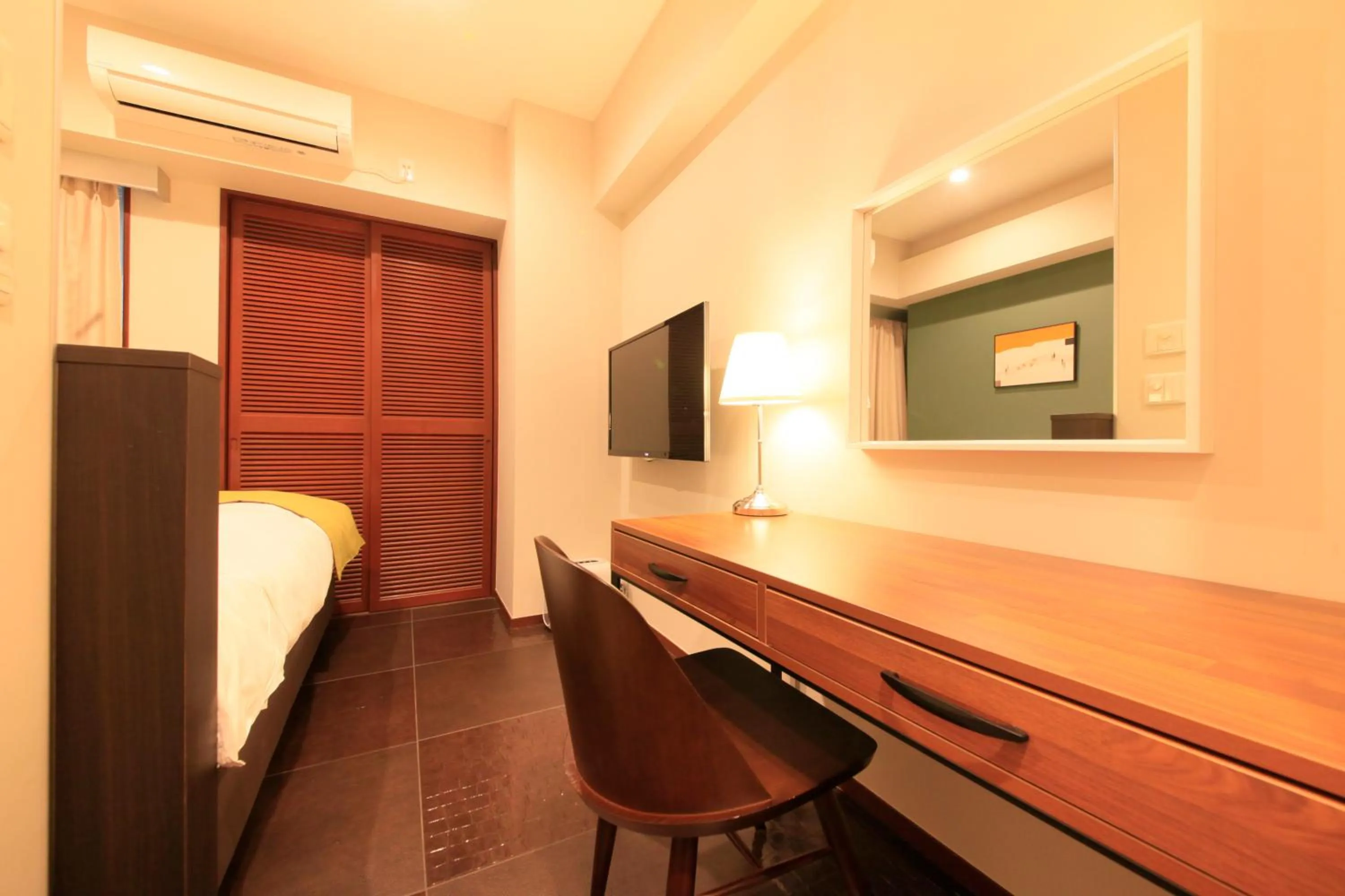 Photo of the whole room, Bed in Centurion Hotel Residential Akasaka Station