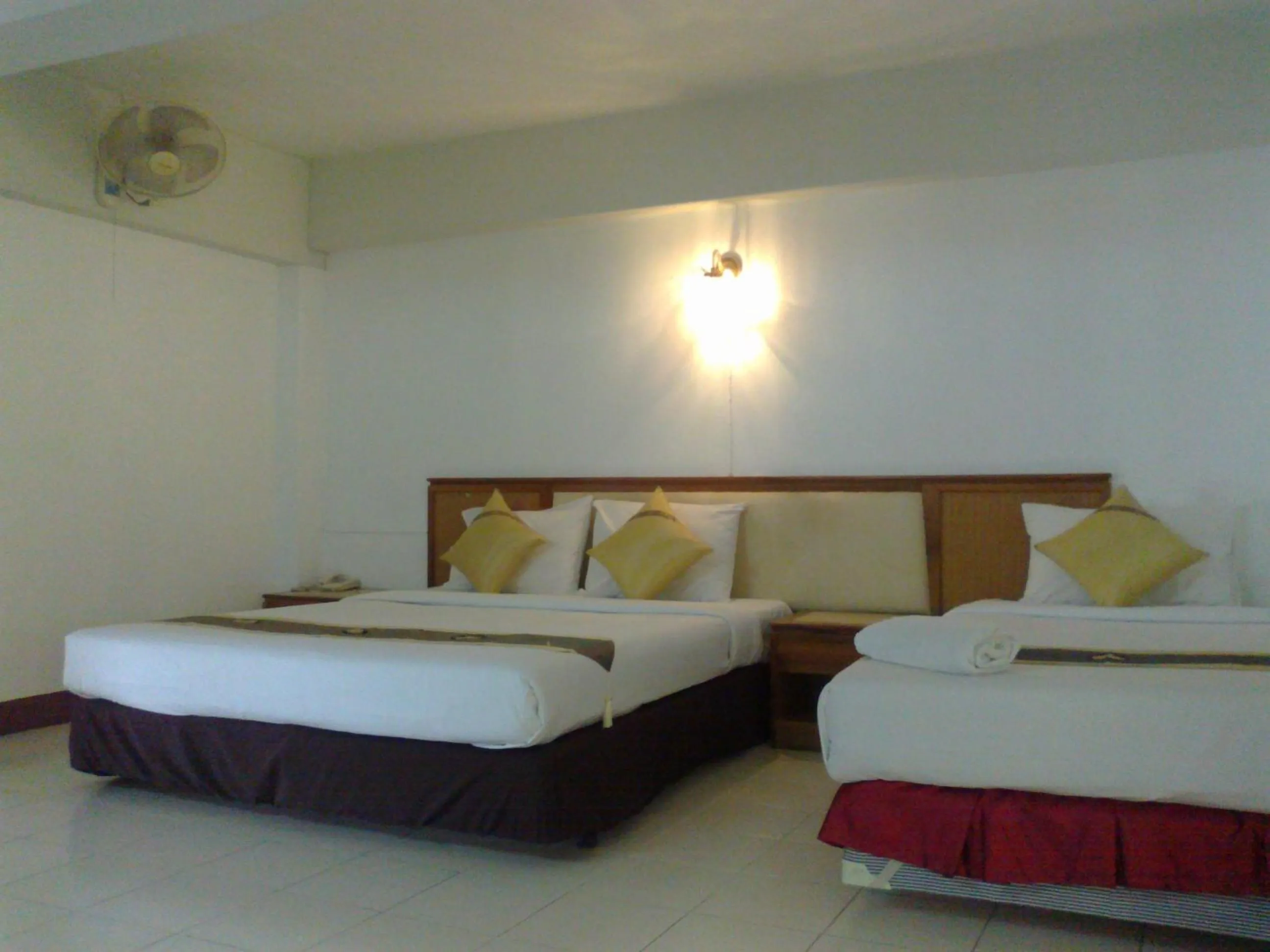 Bed in Top North Hotel