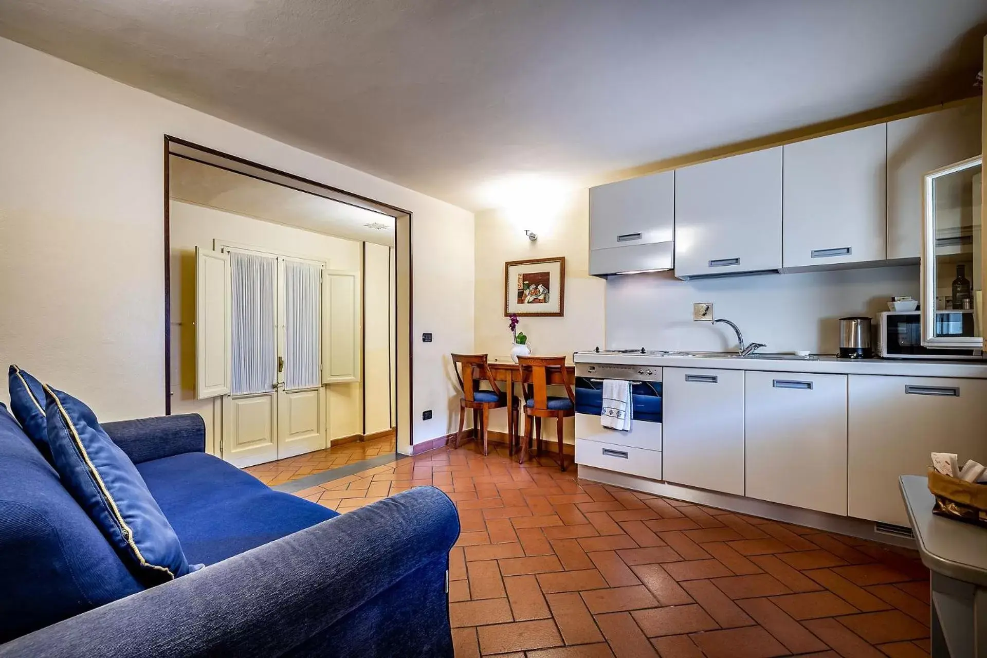 Living room, Kitchen/Kitchenette in Palazzo Gamba Apartments al Duomo