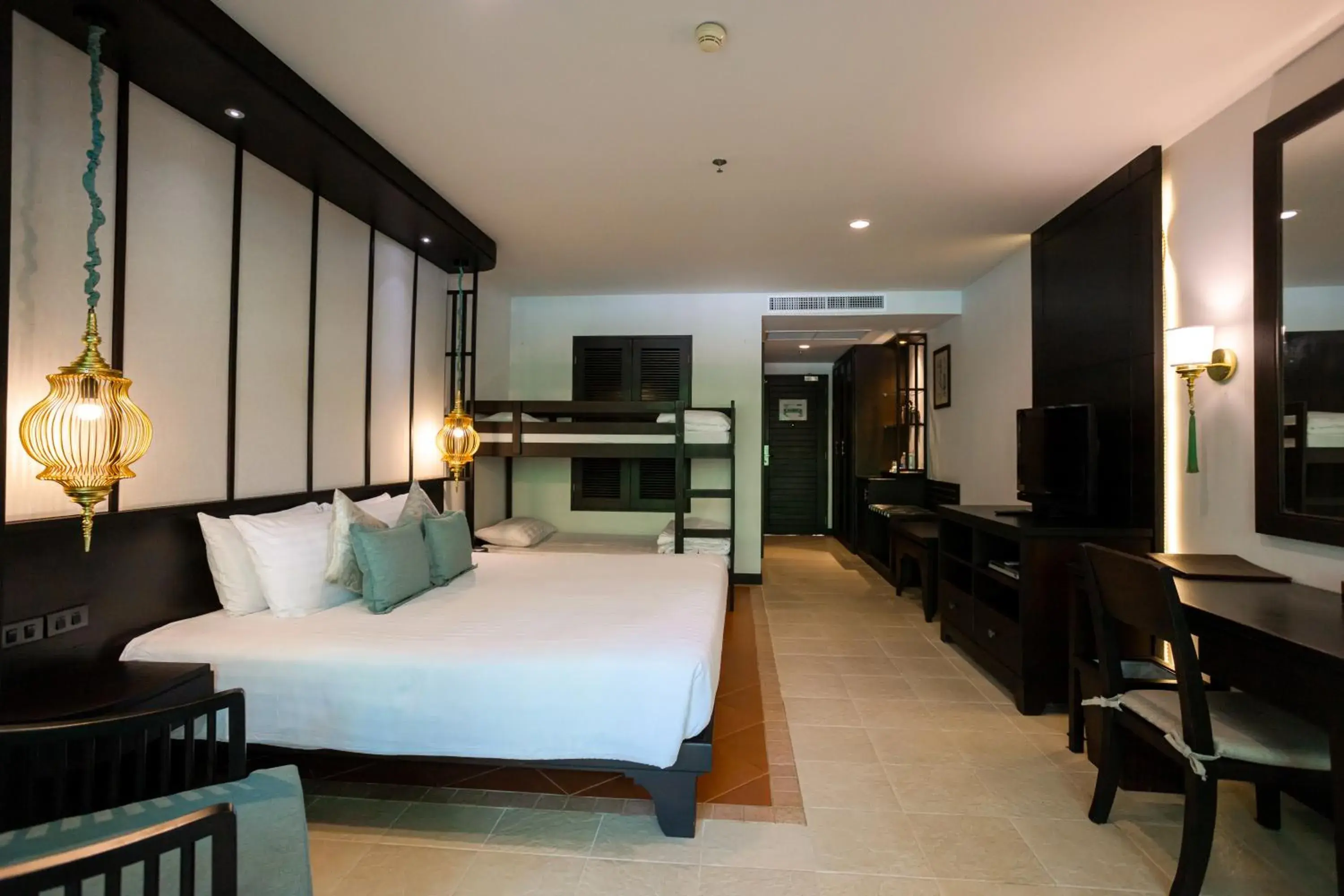 Bedroom in Ravindra Beach Resort & Spa - SHA Extra Plus