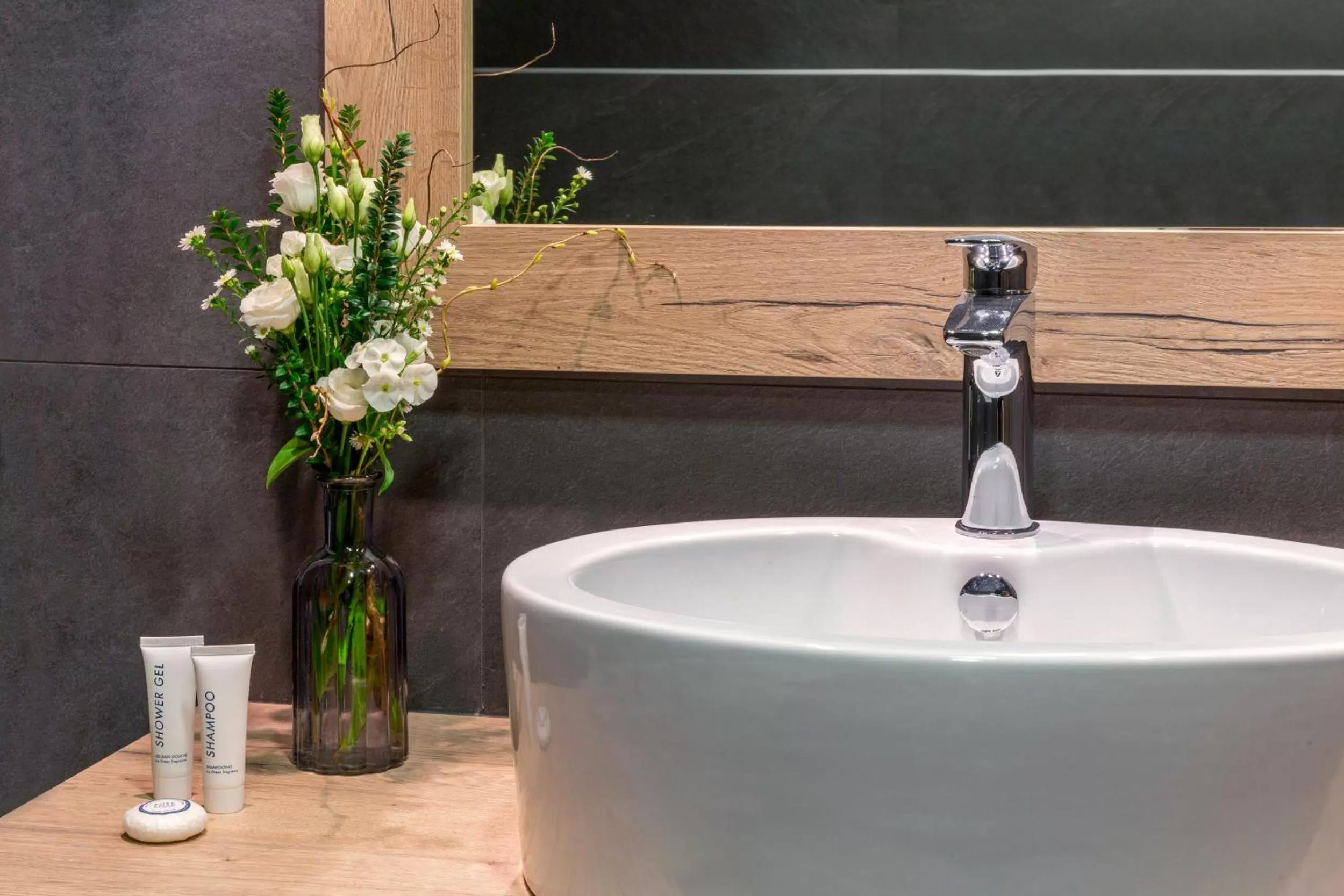 Bathroom in Edelweiss Manotel