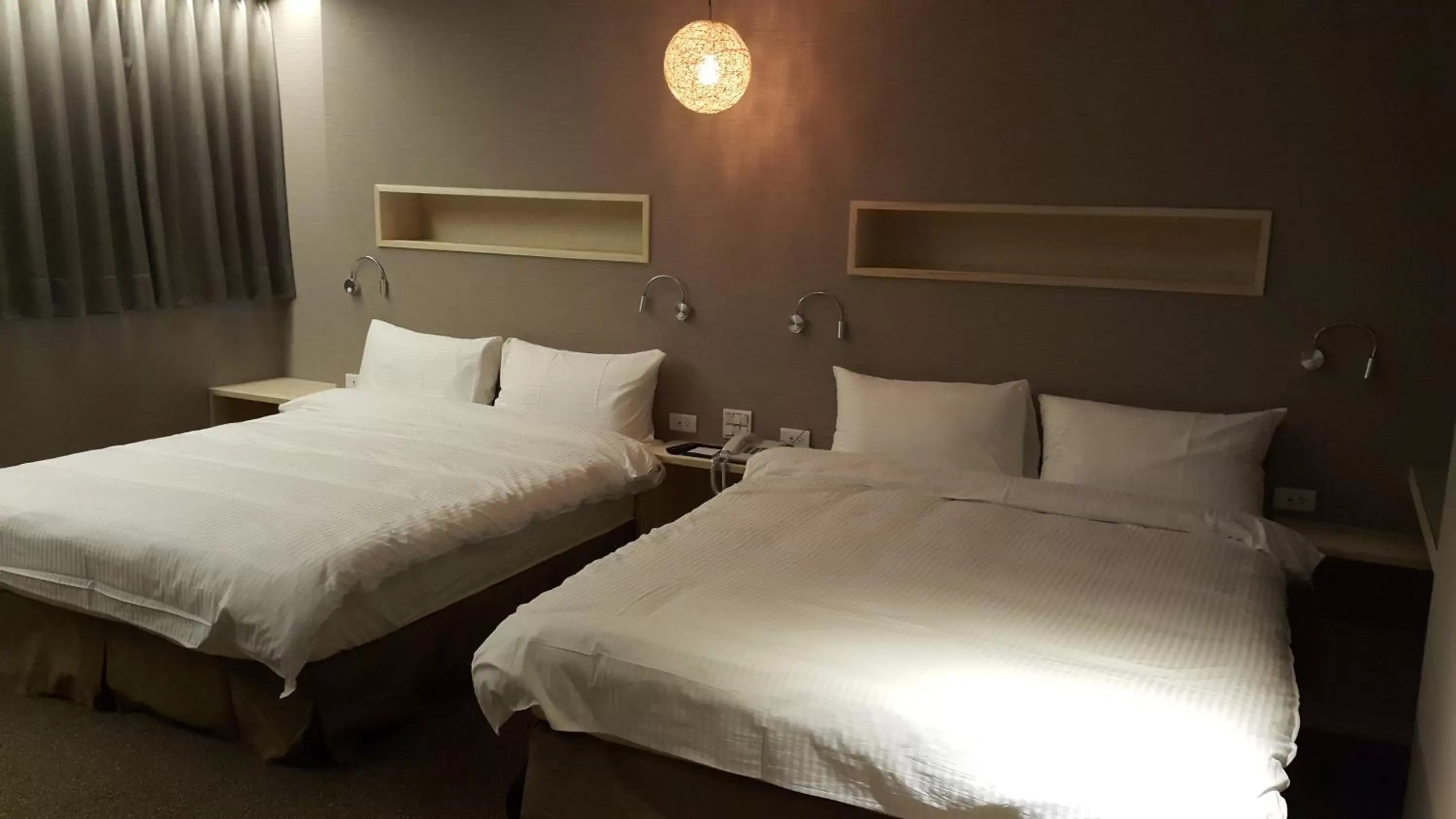 Bed in Bayman Hotel