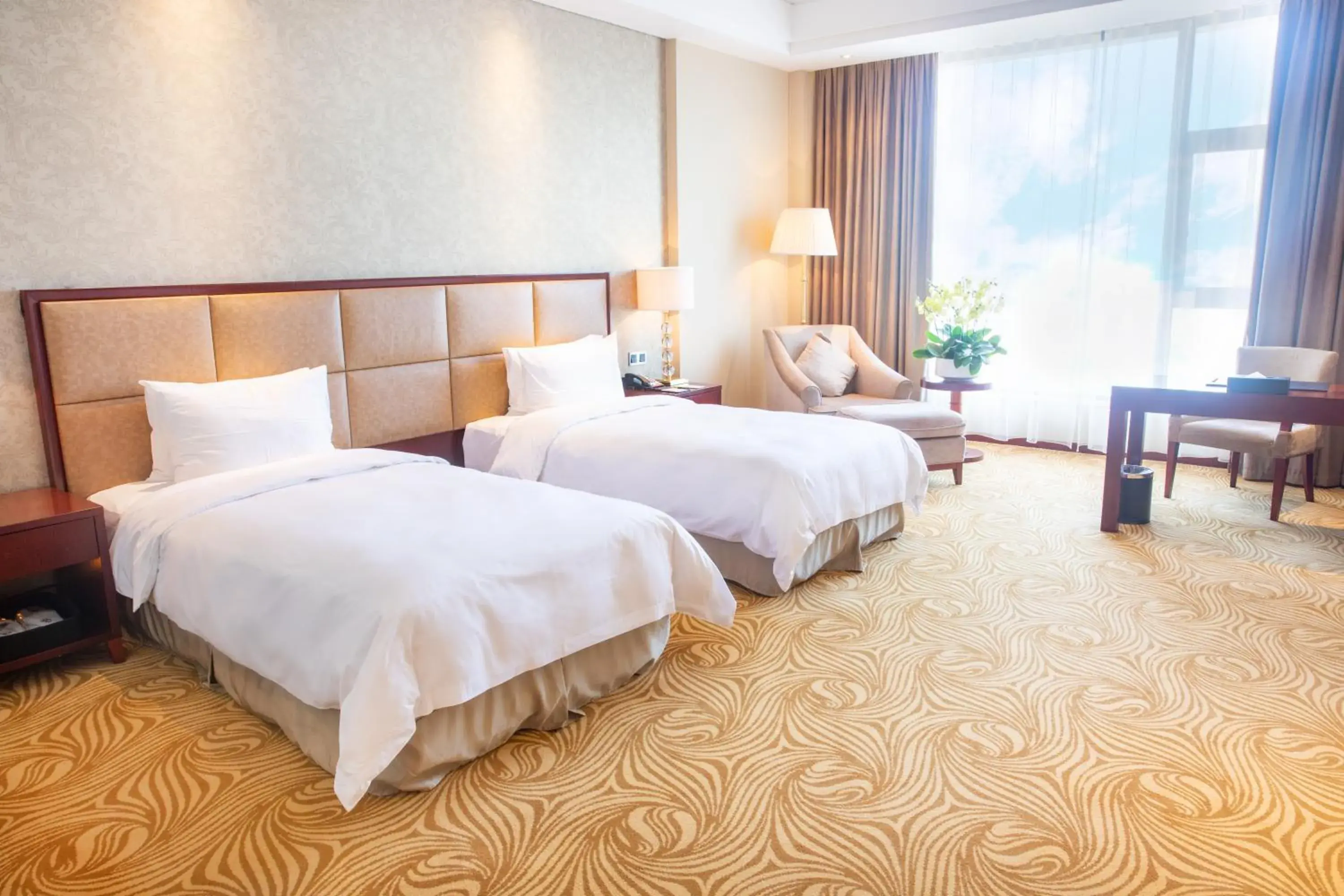 Bed in Holiday Inn Foshan Nanhai Central, an IHG Hotel