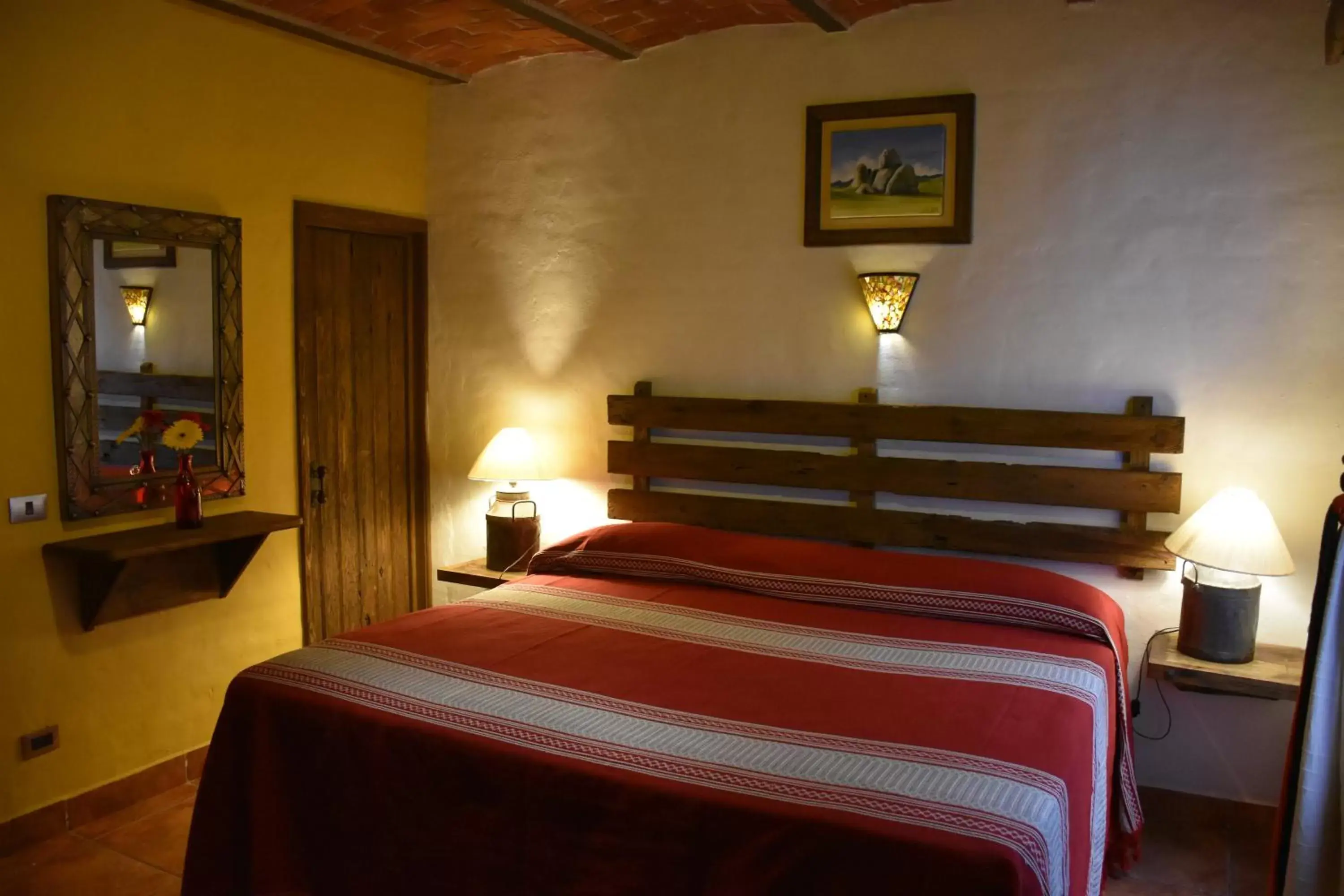 Bed in Hotel Mi Pueblito by Rotamundos