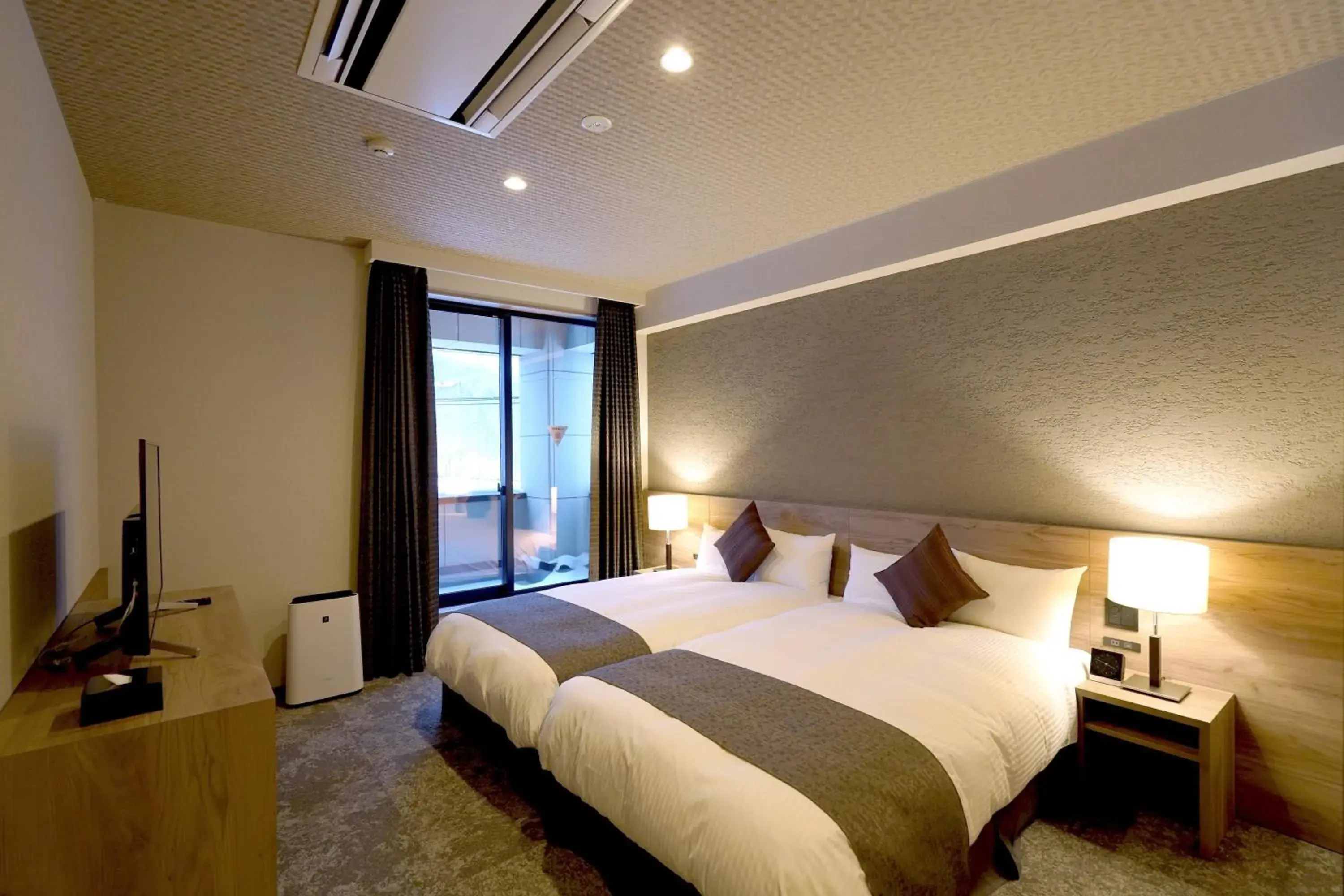 Bed in Winery Hotel and Condominium HITOHANA