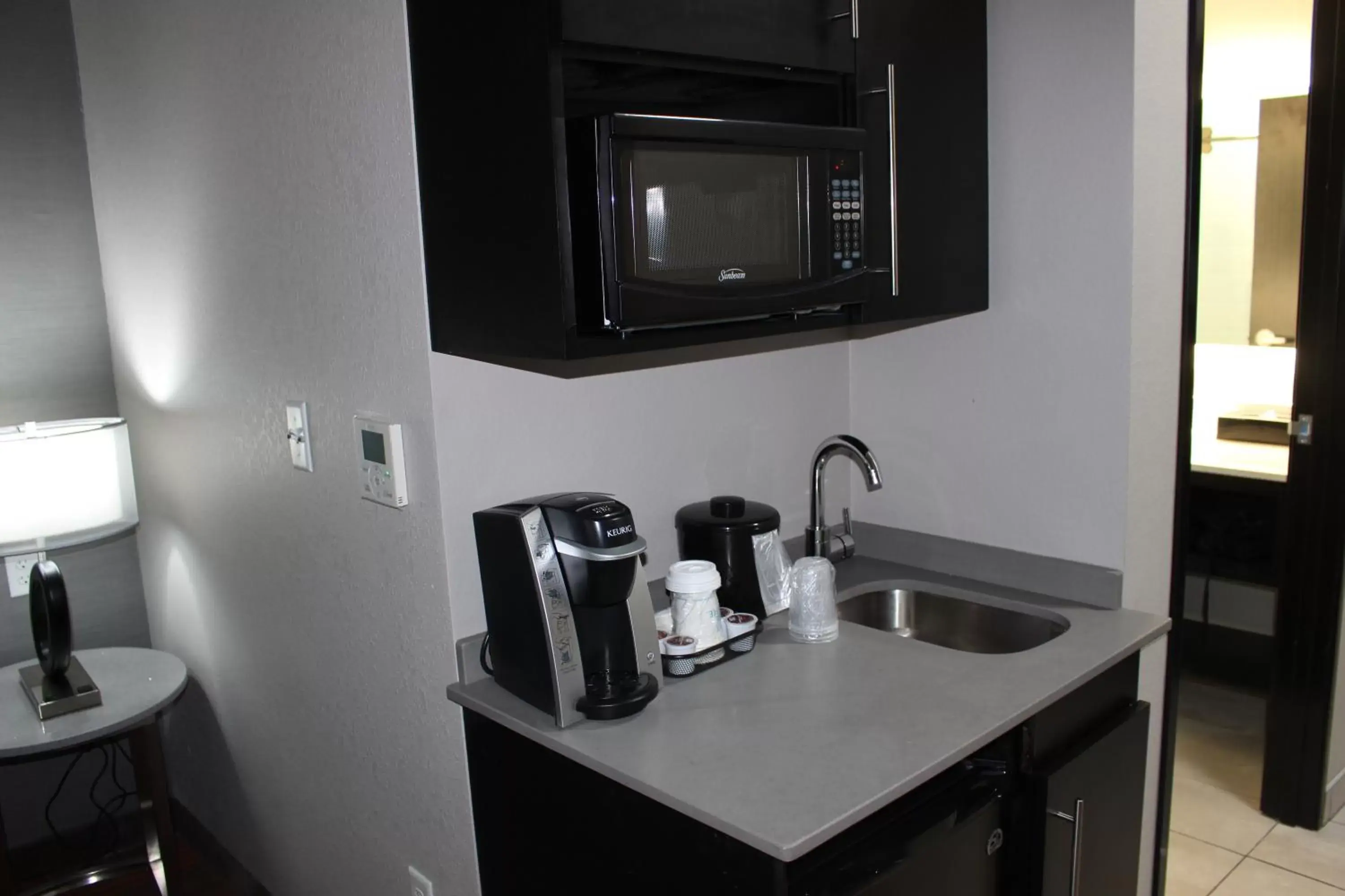 Photo of the whole room, Kitchen/Kitchenette in Holiday Inn Express Shawnee, an IHG Hotel