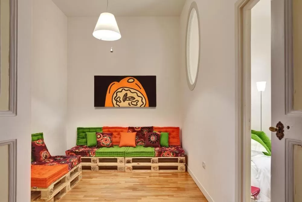 Living room, Bed in Hotel Piazza Bellini & Apartments