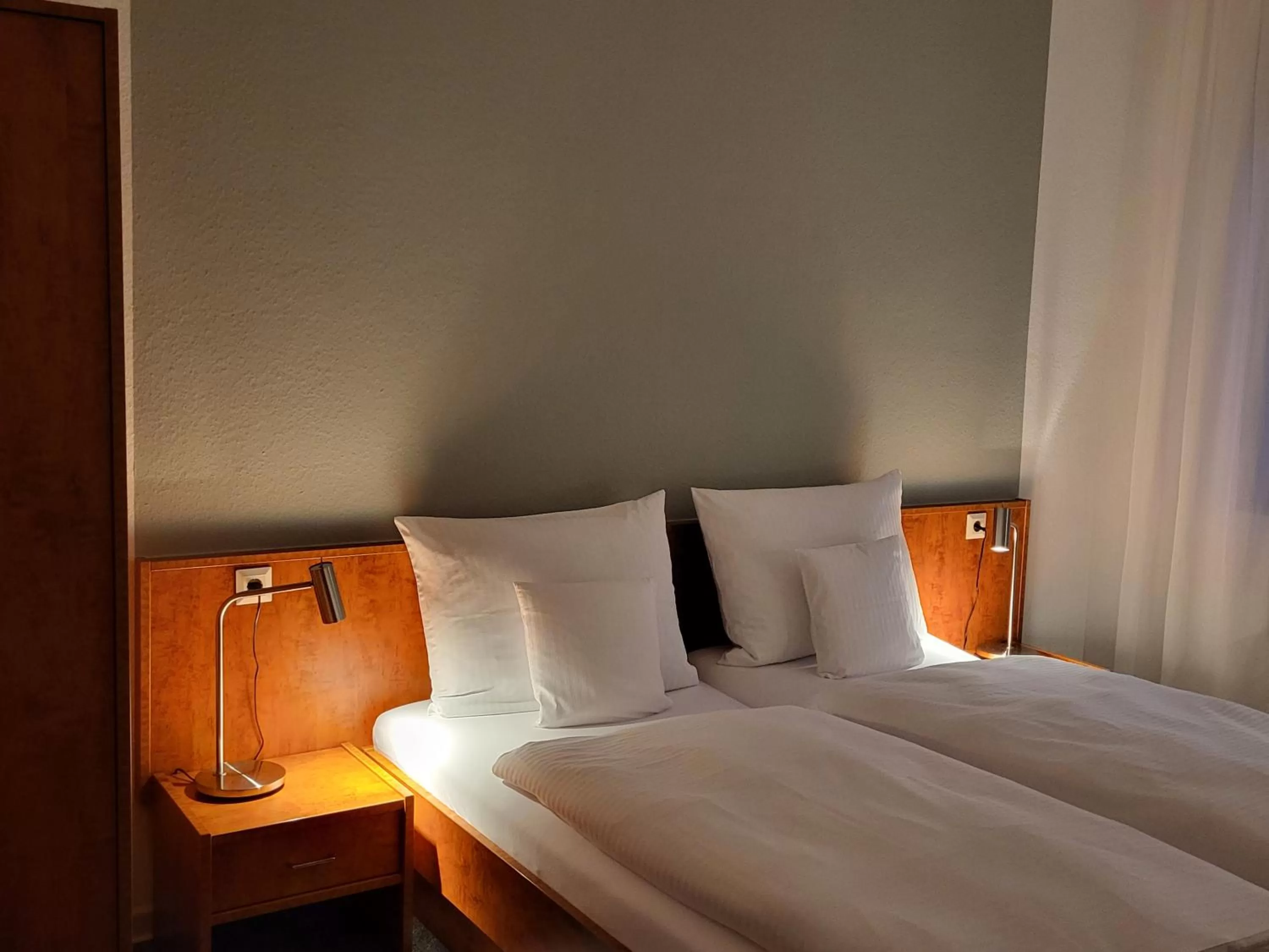 Bed in Parkhotel Am Schwanenteich