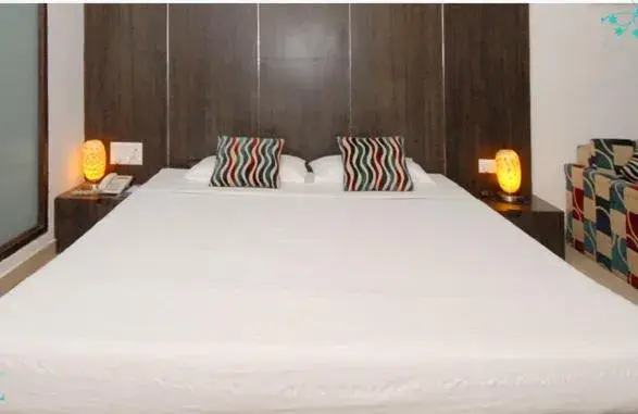 Bed in The New Marrion Hotel