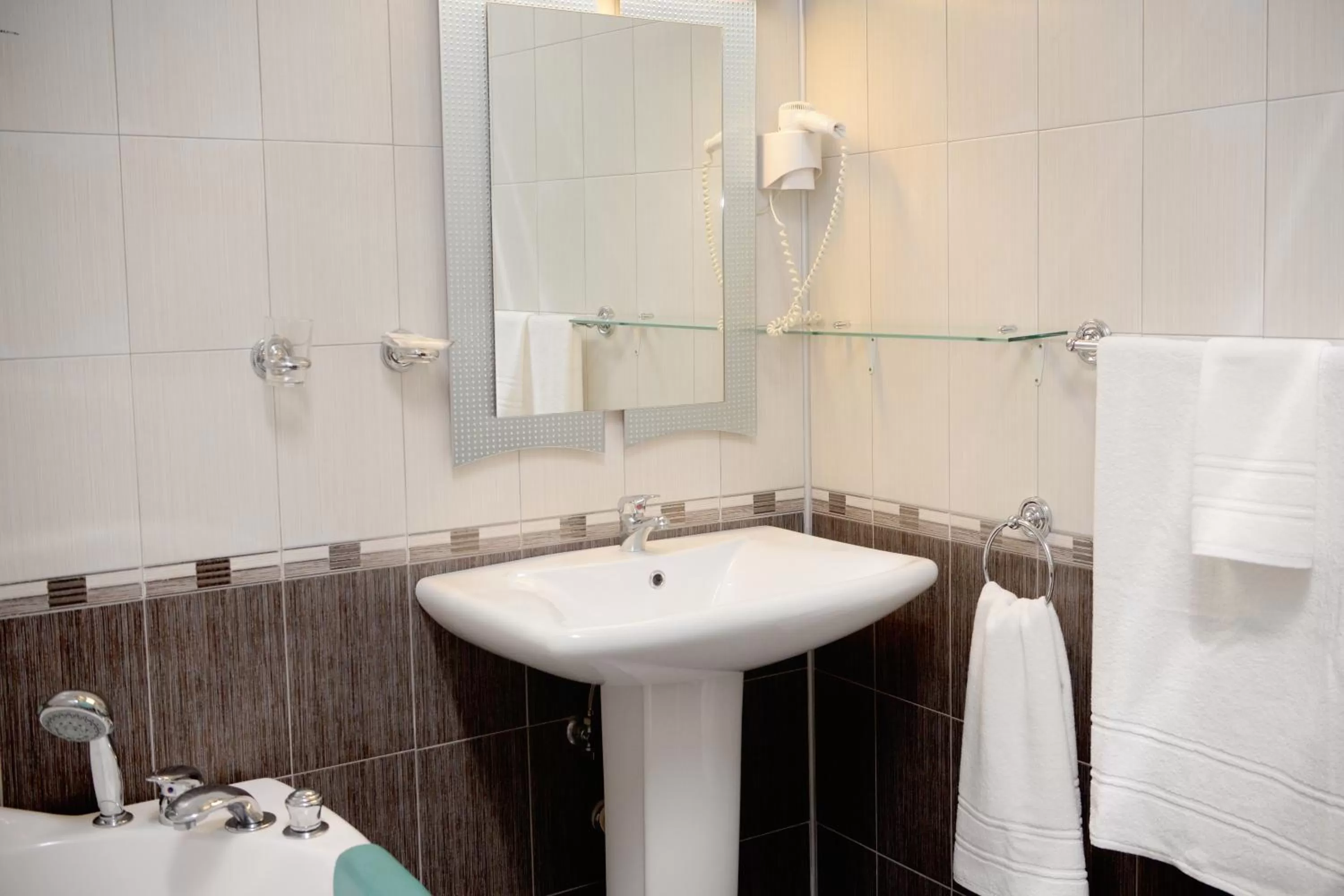 Bathroom in Family Art-Hotel Zora