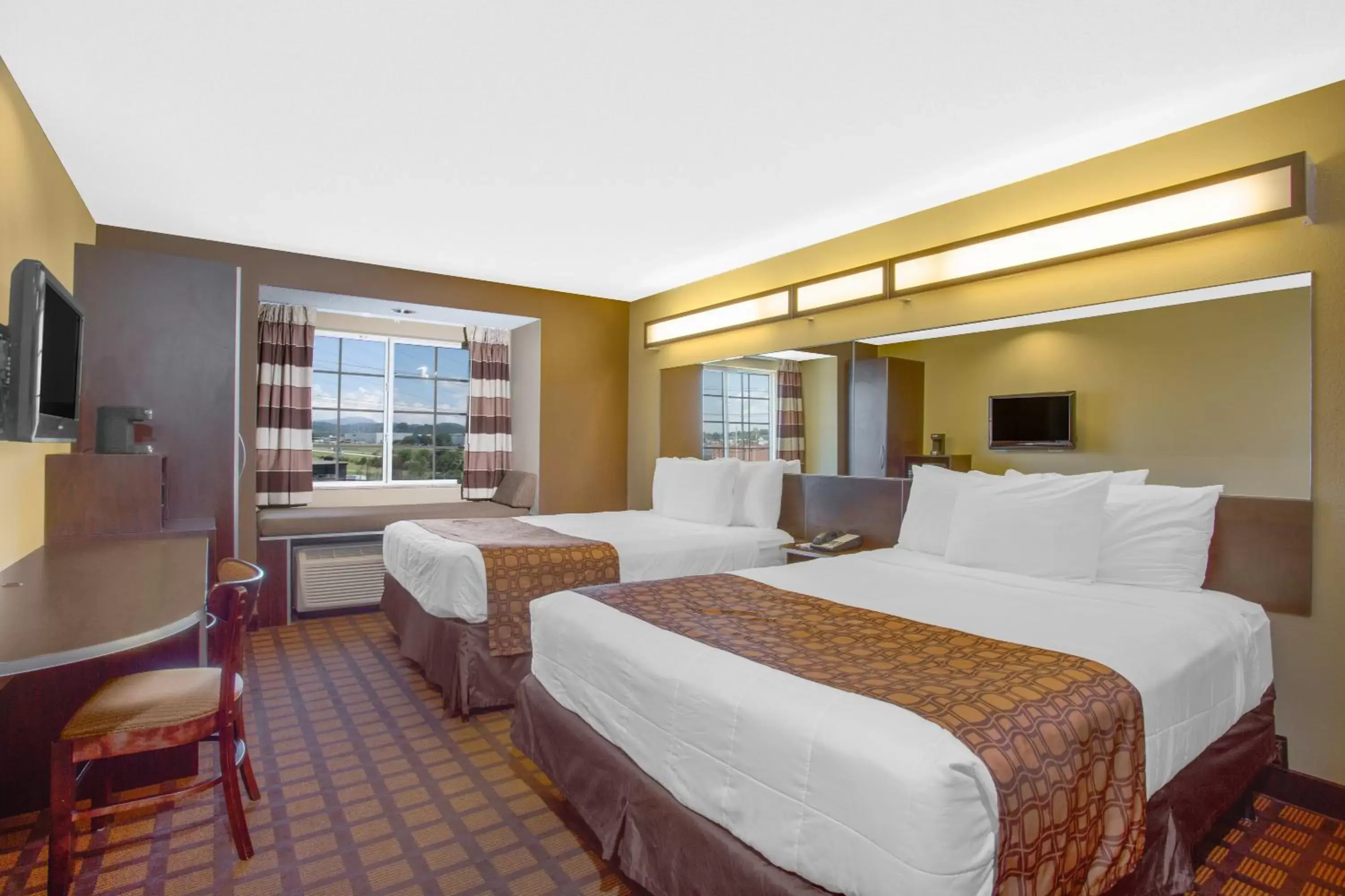 Bed in Microtel Inn & Suites by Wyndham Harrisonburg
