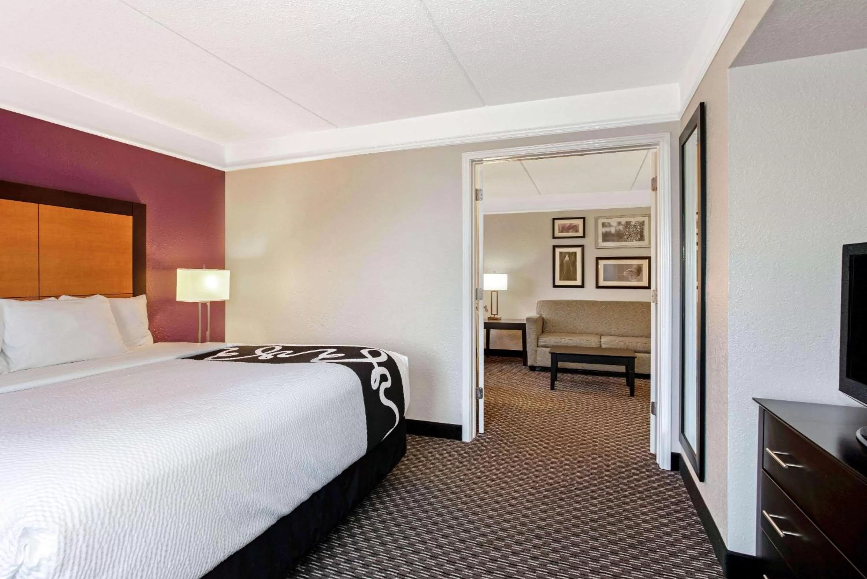 Photo of the whole room, Bed in La Quinta by Wyndham Orlando Airport North - Free Airport Shuttle!