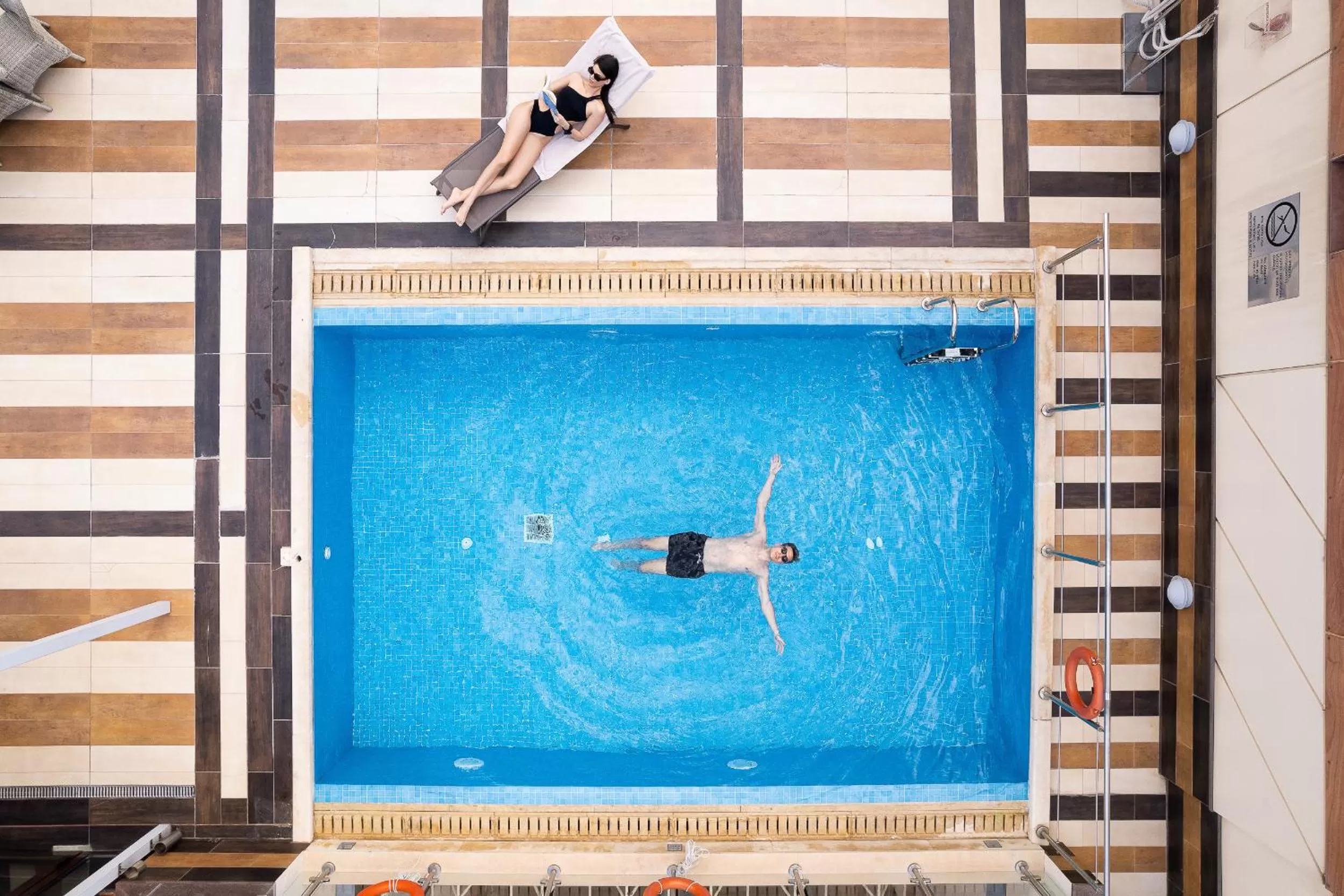 Swimming pool in Crowne Plaza Athens City Centre by IHG