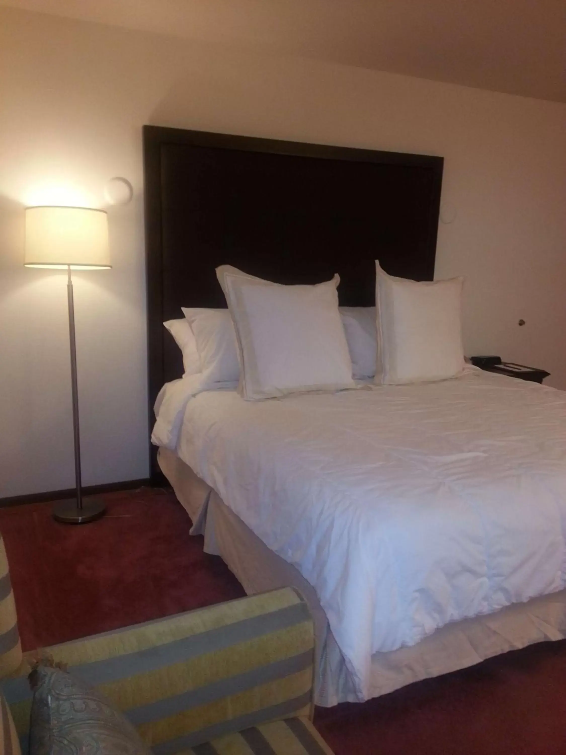 Photo of the whole room, Bed in Harlan Inn and Suites