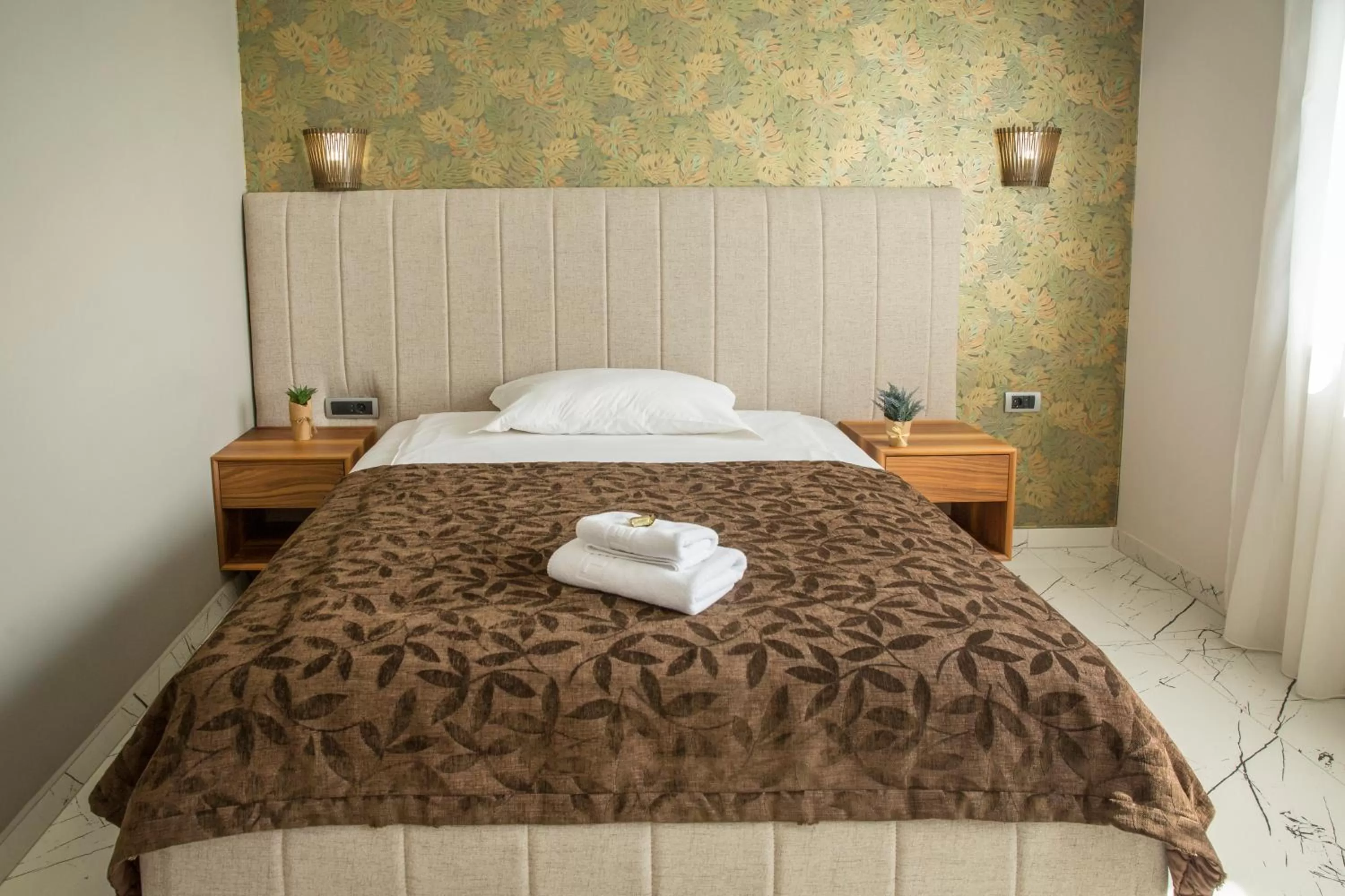 Bed in Garni Boutique Hotel Arta