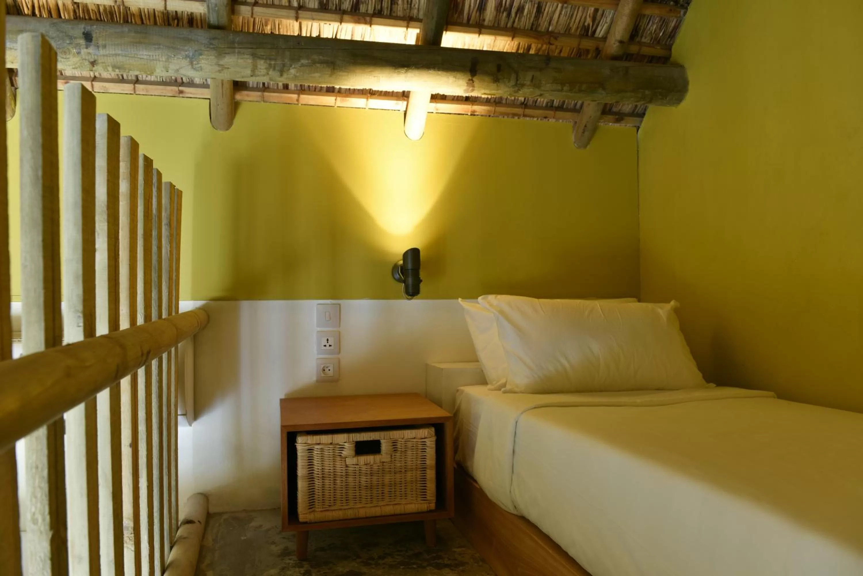 Bed in Veranda Tamarin Hotel & Spa