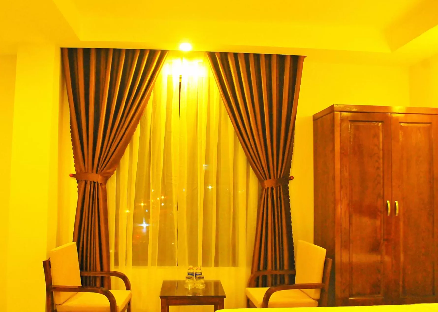 TV/Entertainment Center in Aries Hotel