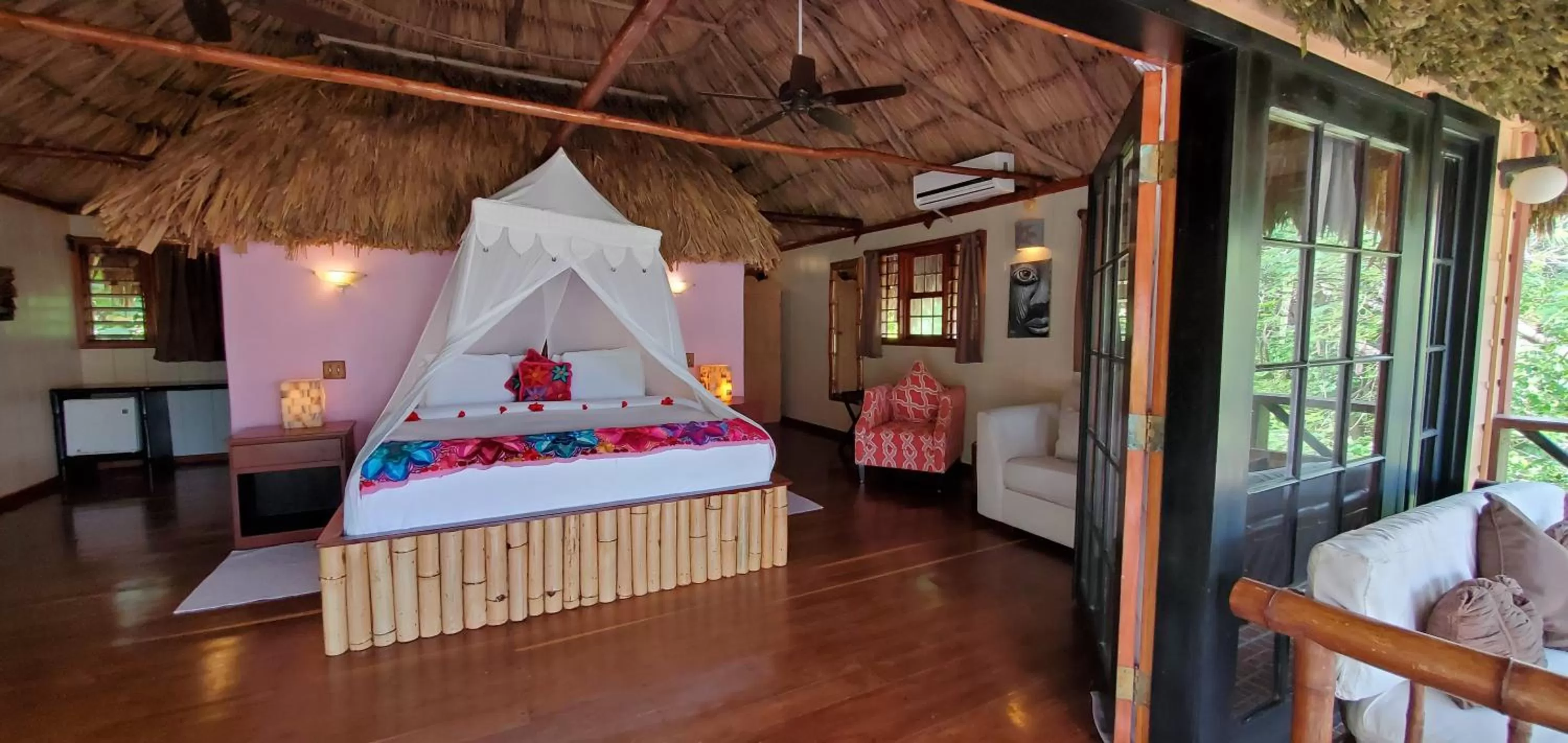 Bed in Portofino Beach Resort-An Authentic Island Escape!