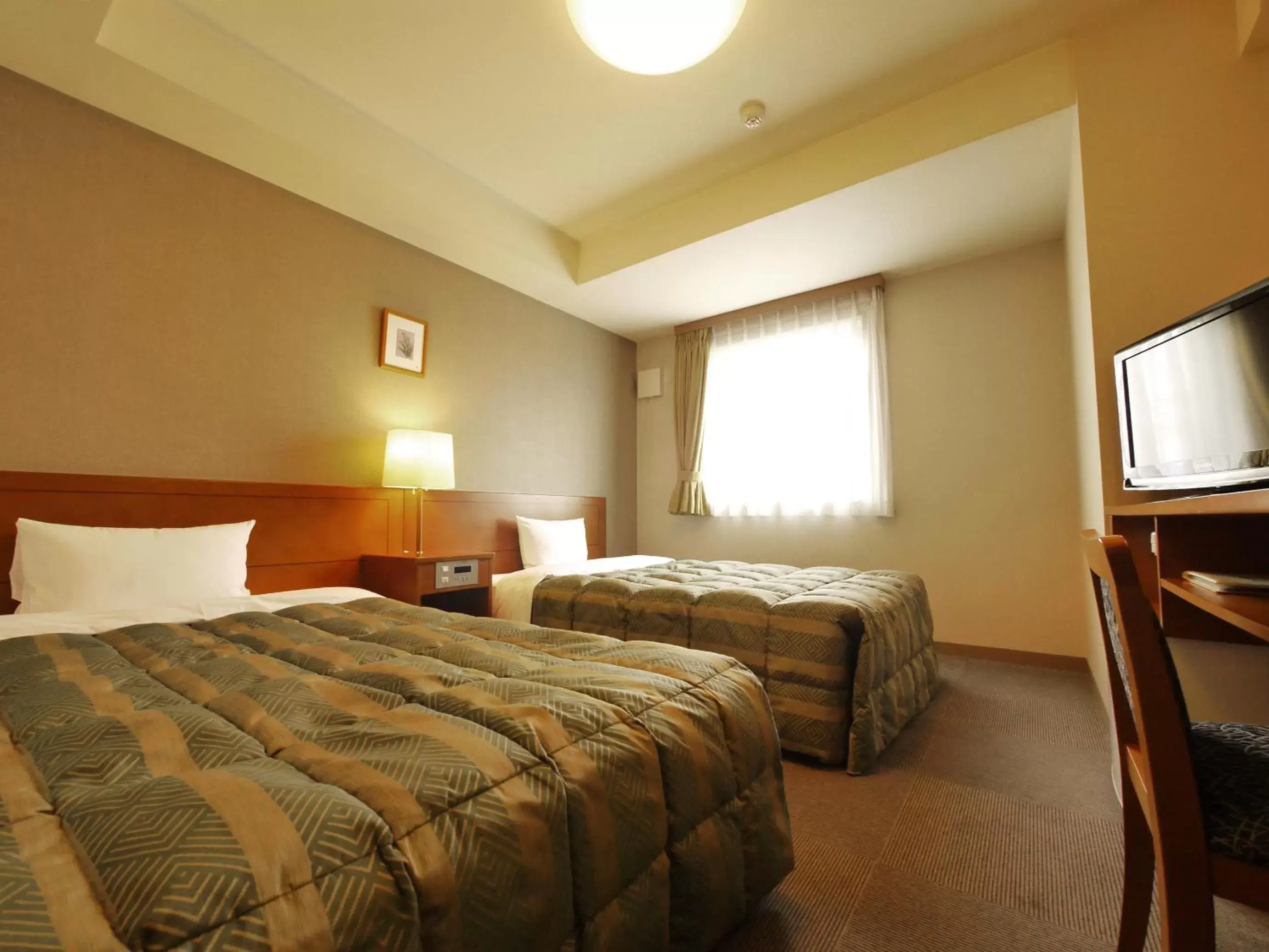 Photo of the whole room, Bed in Hotel Route-Inn Honjo Ekiminami