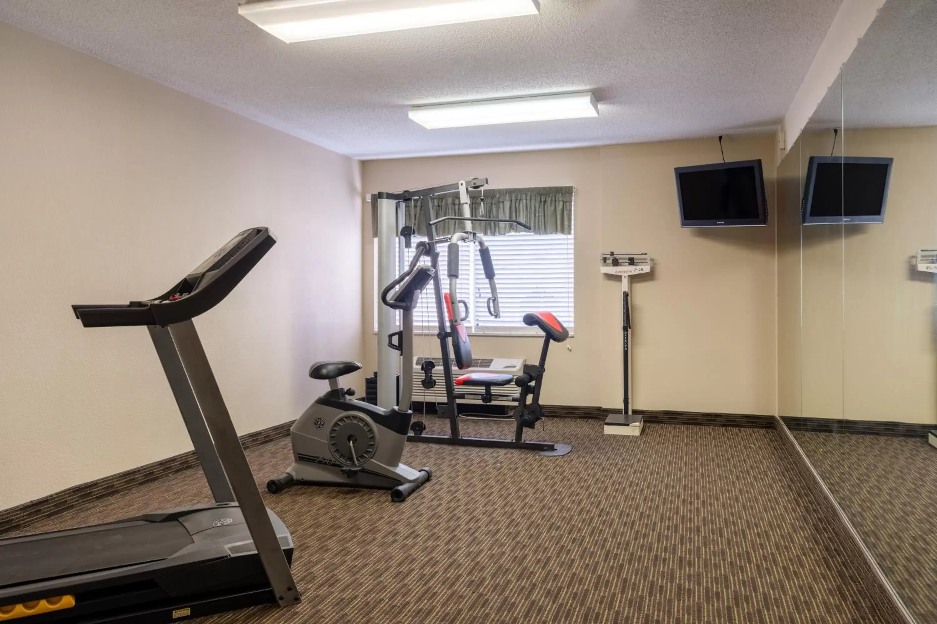 Fitness centre/facilities, Fitness Center/Facilities in AmericInn by Wyndham Cedar Rapids North