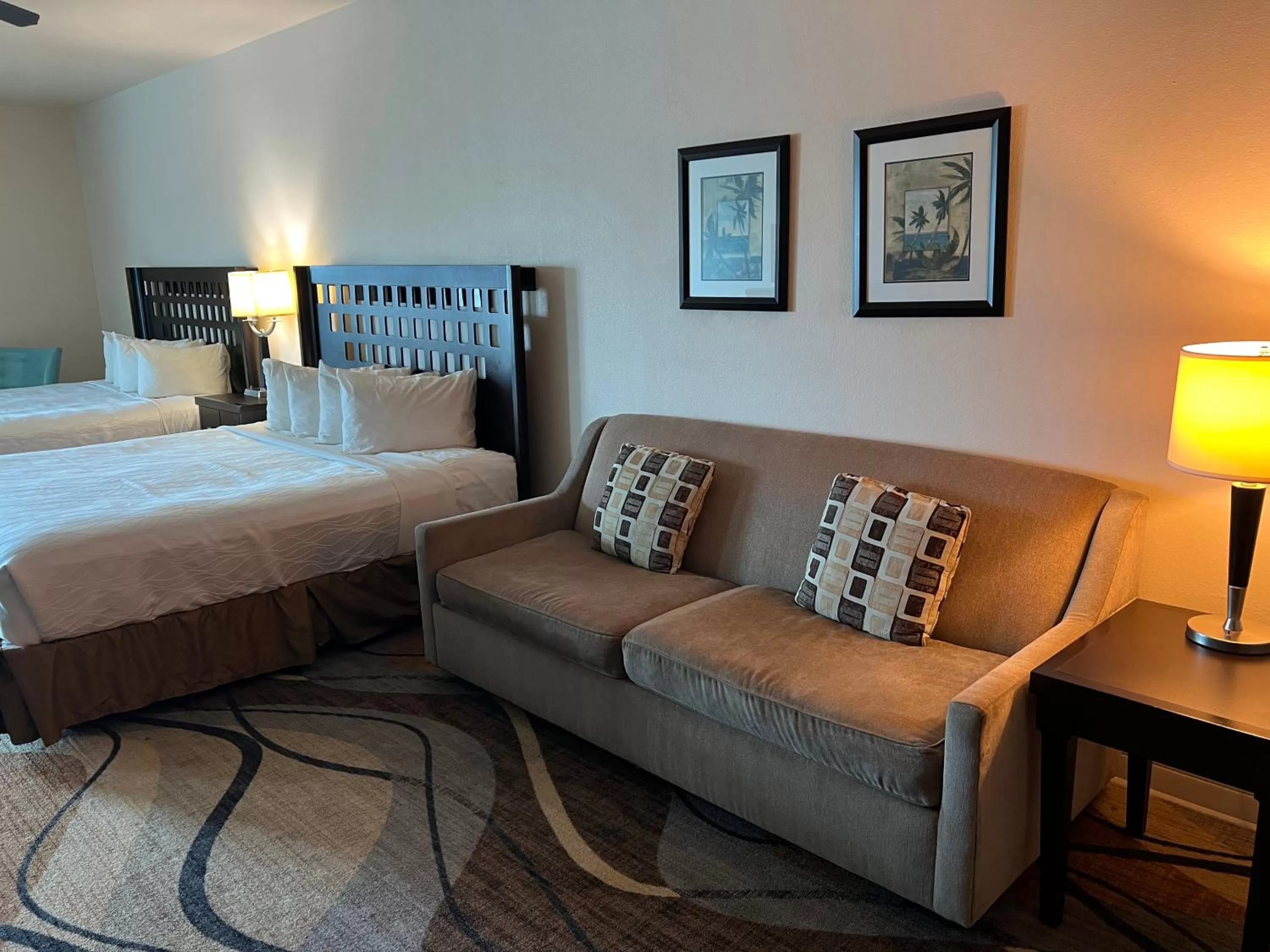 Bed in Sunchase Inn & Suites