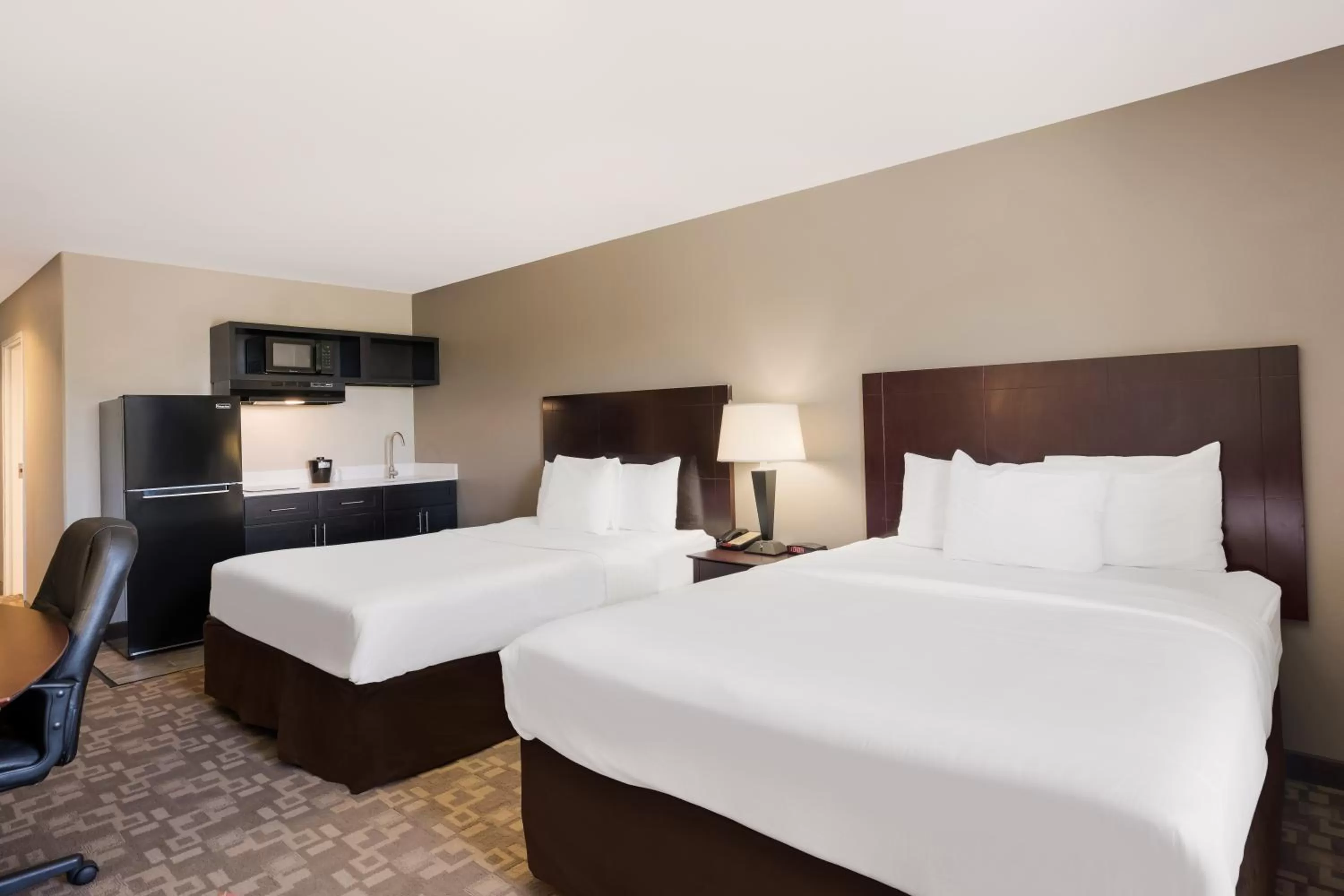 Kitchen or kitchenette, Bed in Suburban Studios Berwick - Morgan City