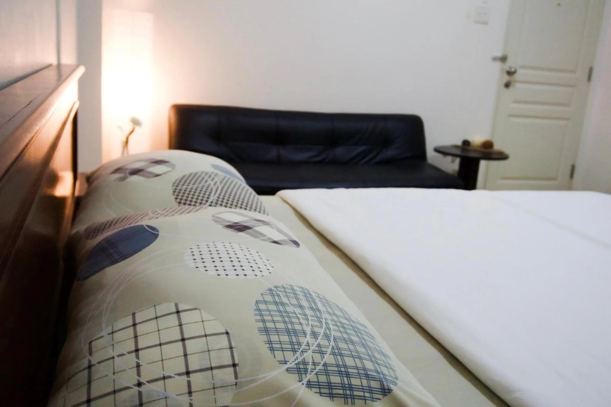 Bed in Baan Boonanan Apartment