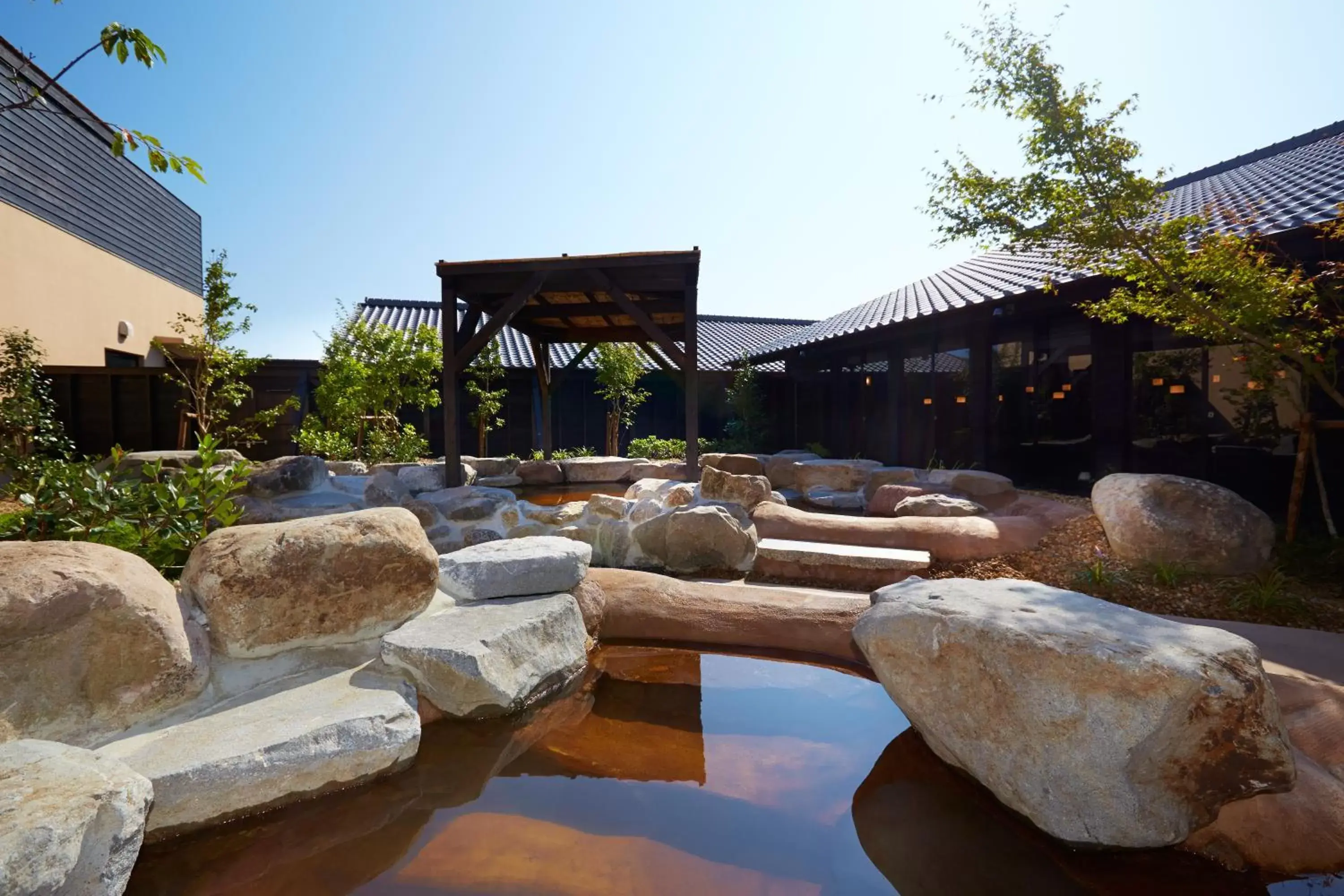 Hot Spring Bath, Swimming Pool in i + Land Nagasaki