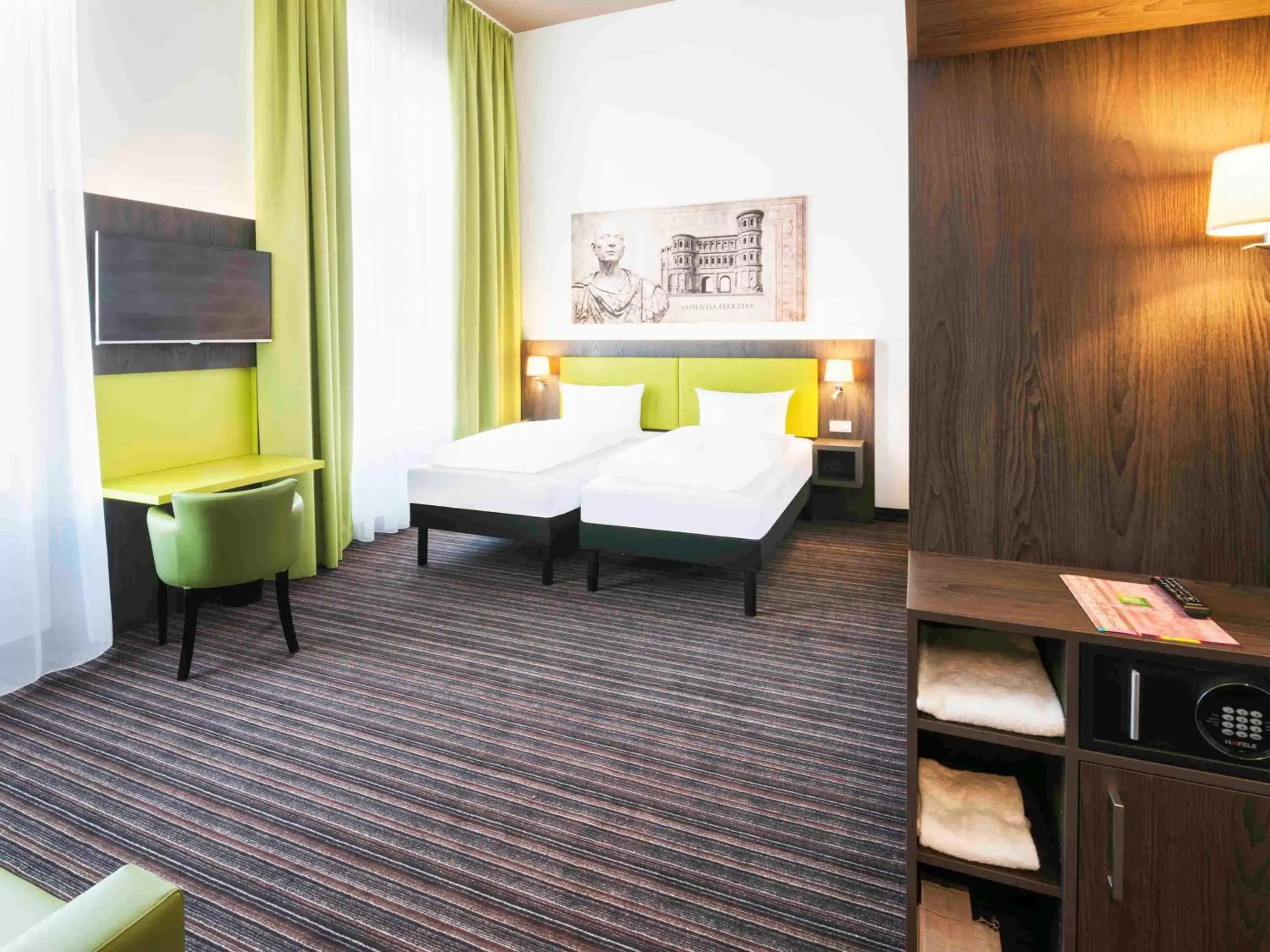 Photo of the whole room, Bed in Ibis Styles Trier