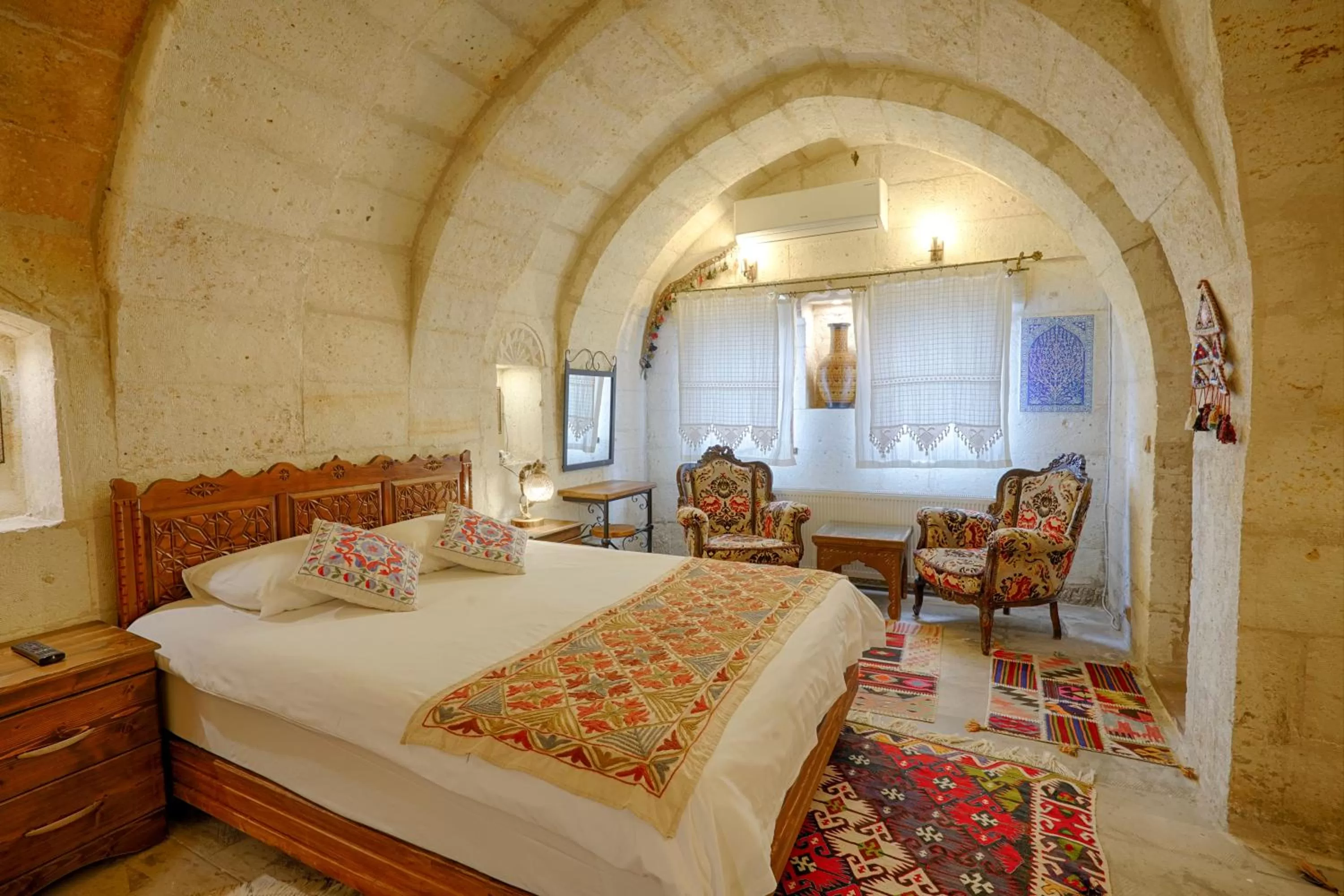 Bed in Tulip Cave Suites