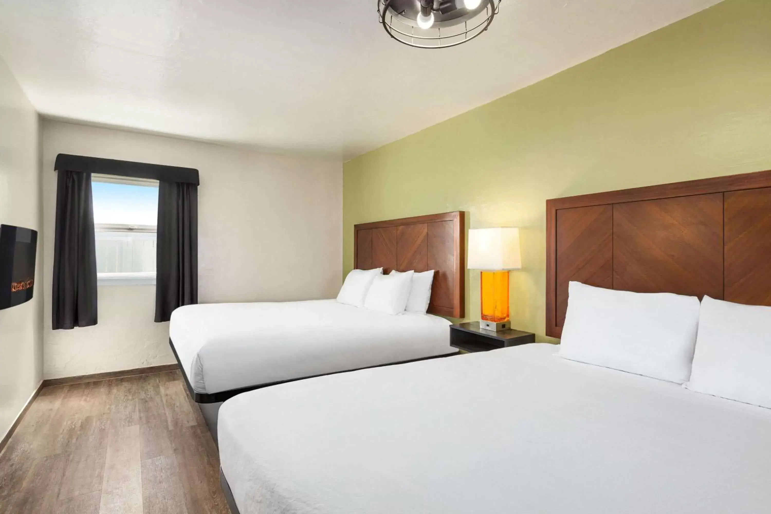 Photo of the whole room, Bed in Baymont by Wyndham Fort Bragg Photo of the whole room, Bed in Baymont by Wyndham Fort Bragg