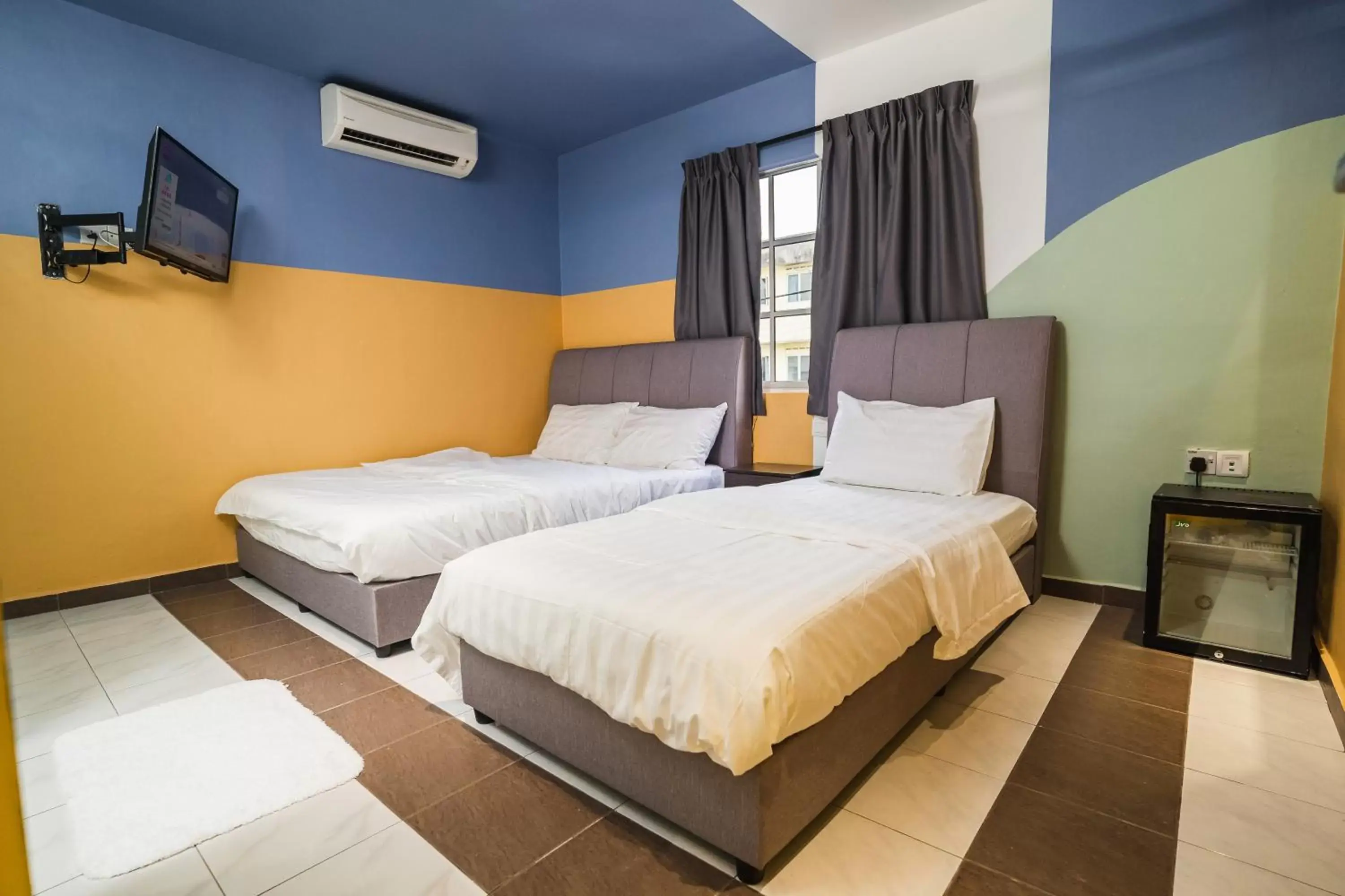 Superior Triple Room in The Cave By Cactus Hotel Skudai Superior Triple Room in The Cave By Cactus Hotel Skudai