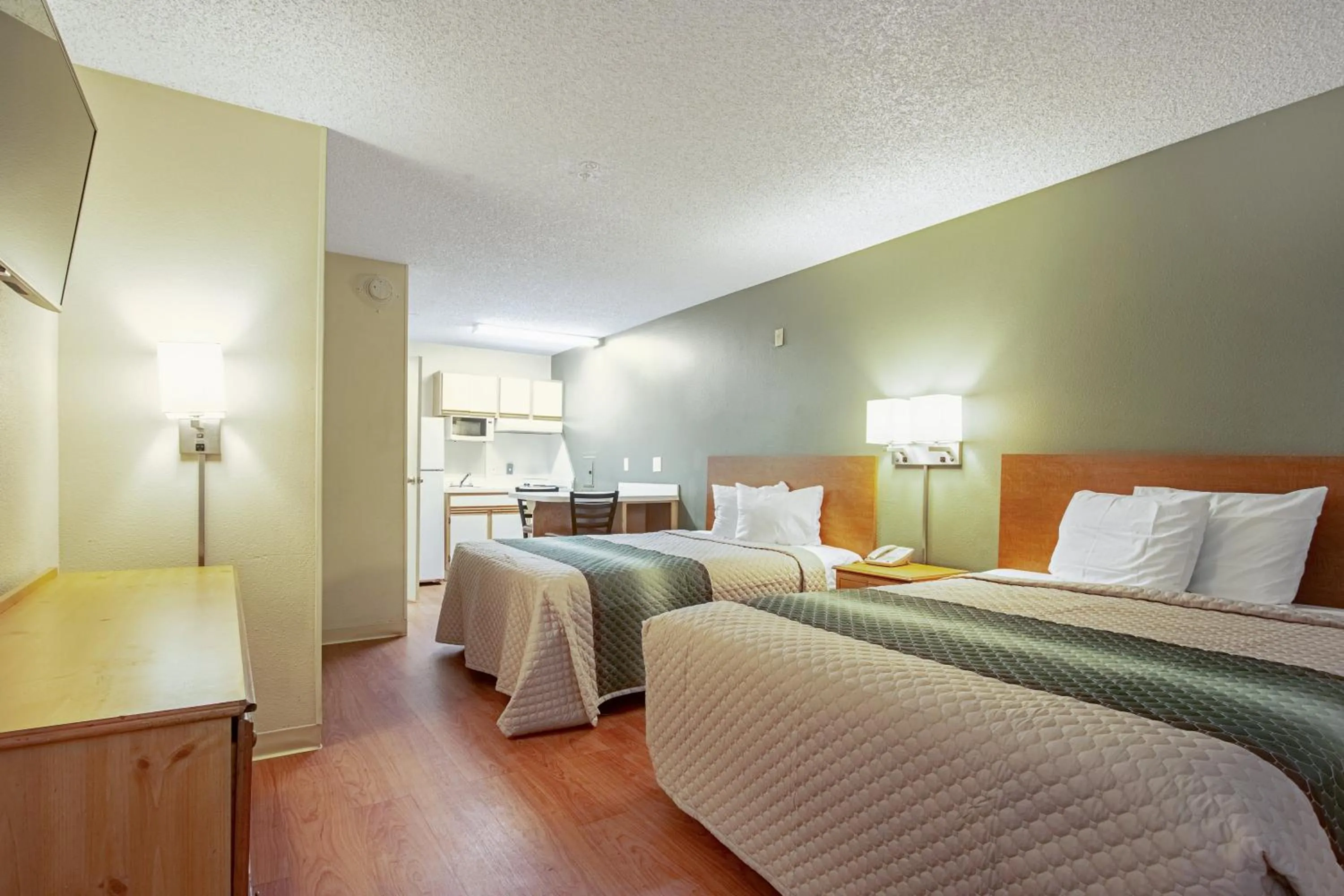 Photo of the whole room, Bed in HomeTowne Studios by Red Roof Phoenix - Black Canyon Highway