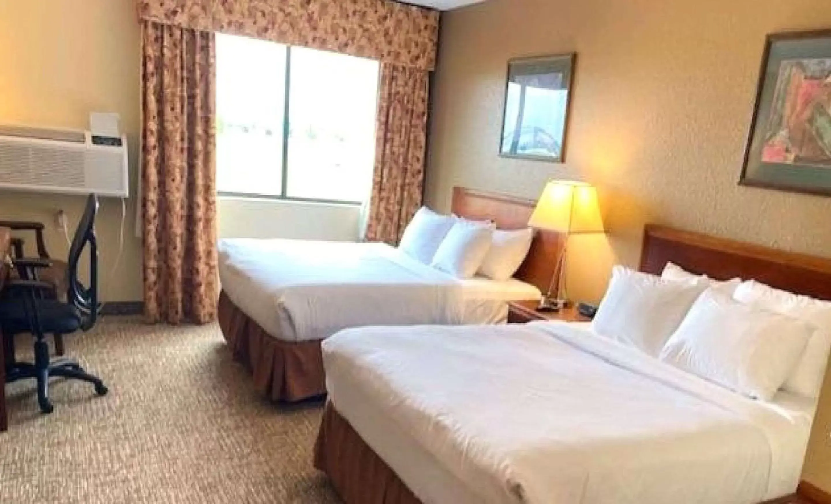 Bed in Comfort Inn & Suites at I-74 and 155