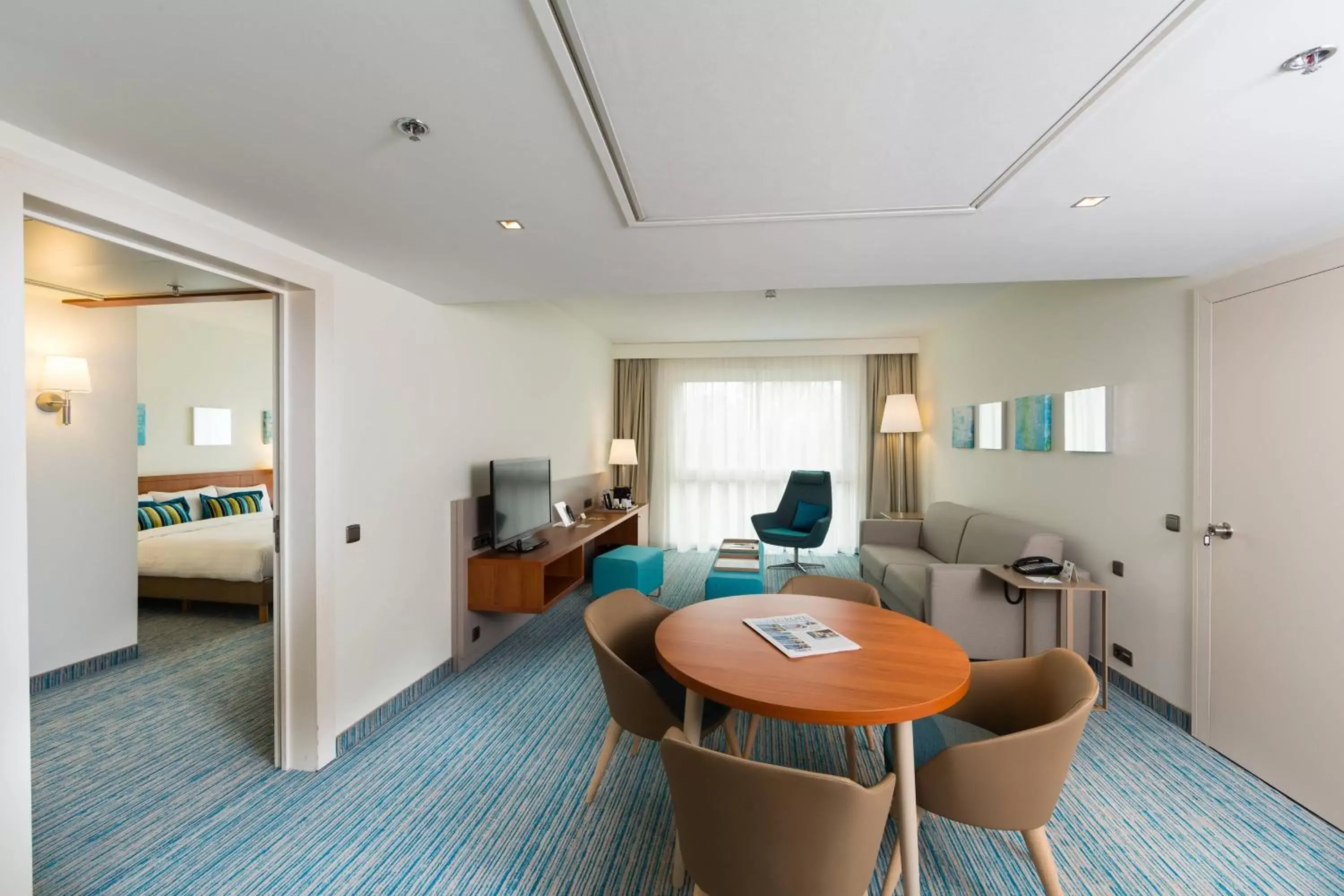 Bedroom, Dining Area in Courtyard By Marriott Brussels