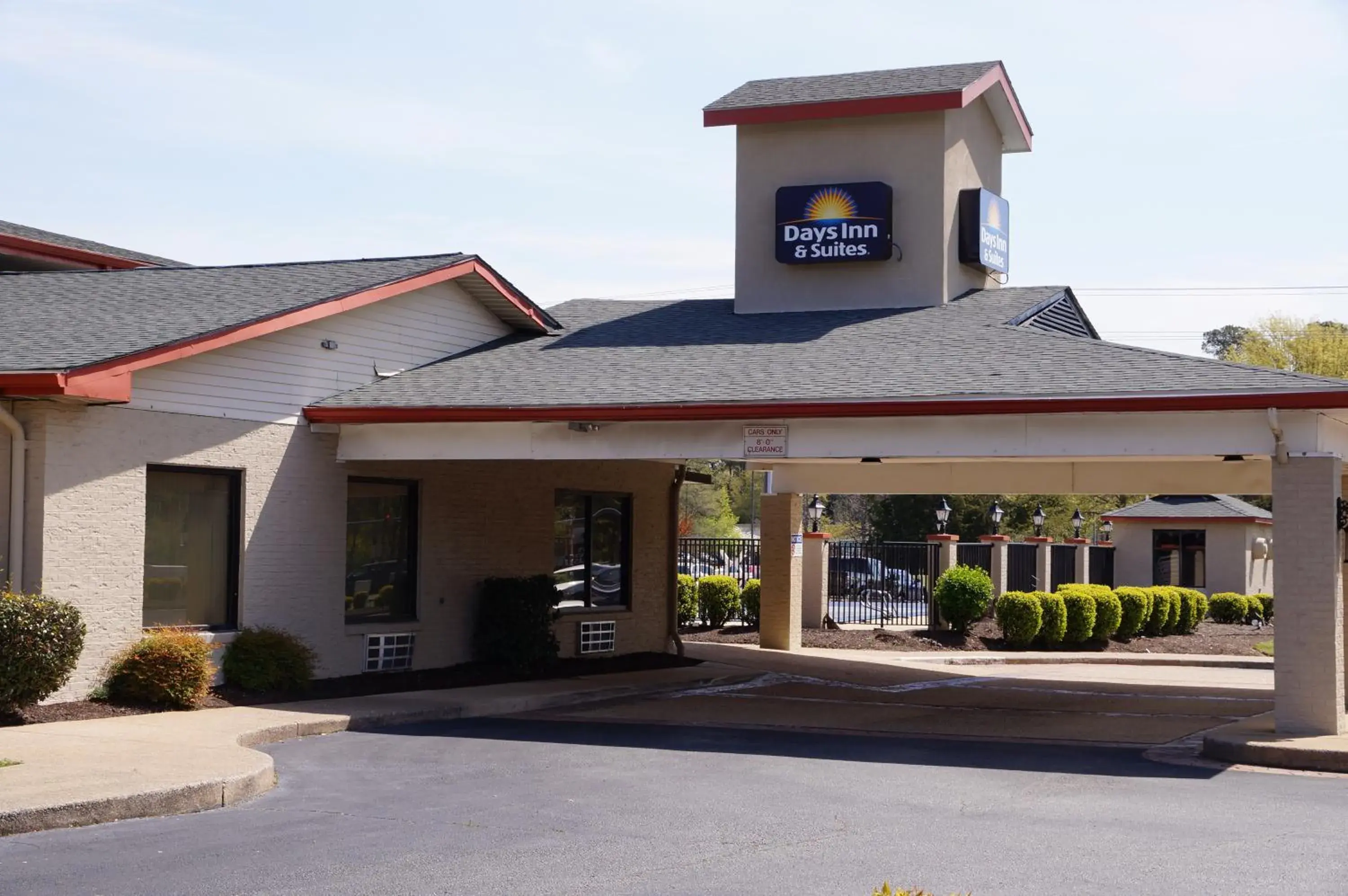 Property building in Days Inn & Suites by Wyndham Colonial