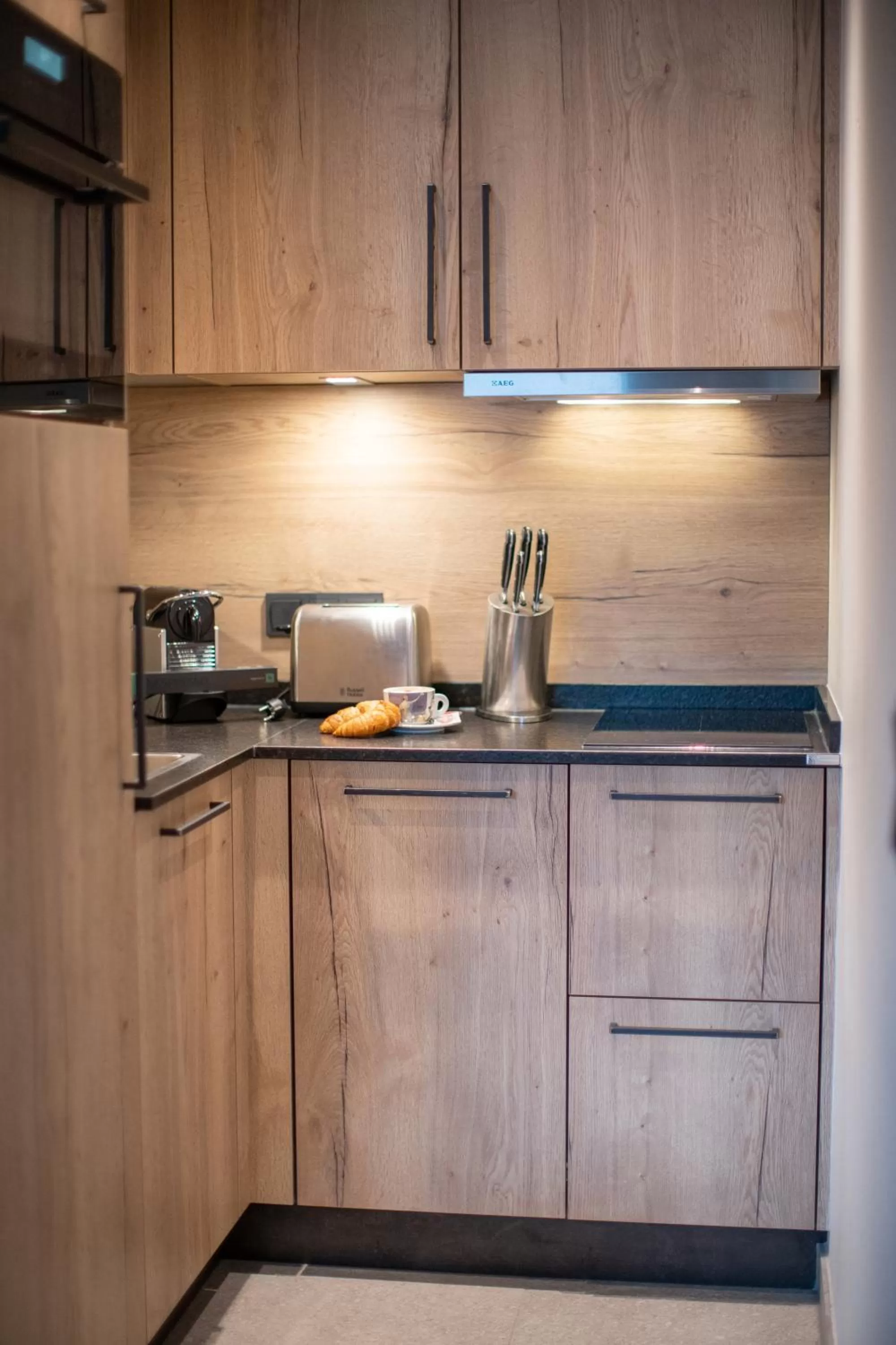 Kitchen or kitchenette in Emma Deluxe Aparthotel direkt beim Skibus