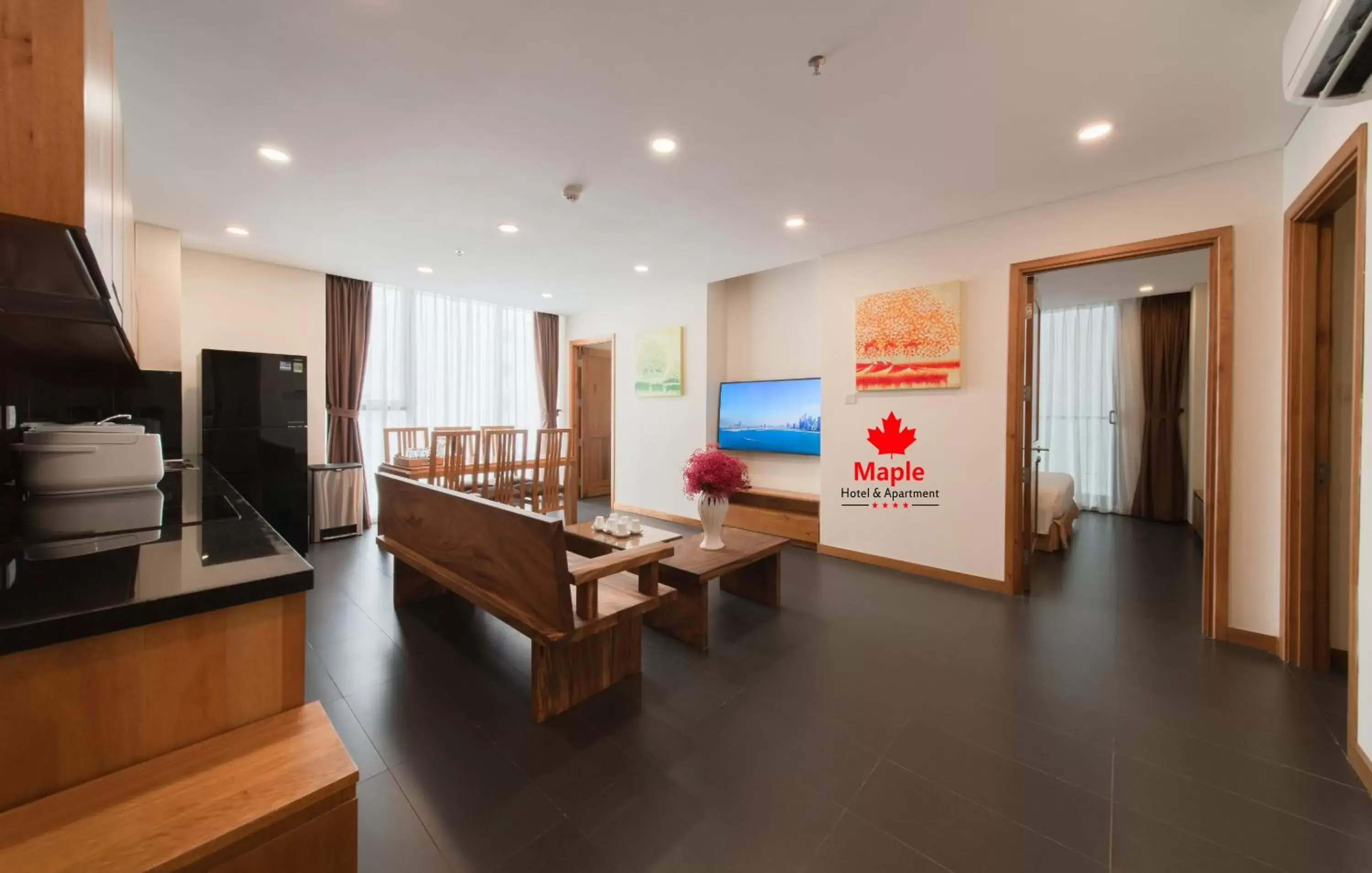 TV and multimedia, TV/Entertainment Center in Maple Hotel & Apartment
