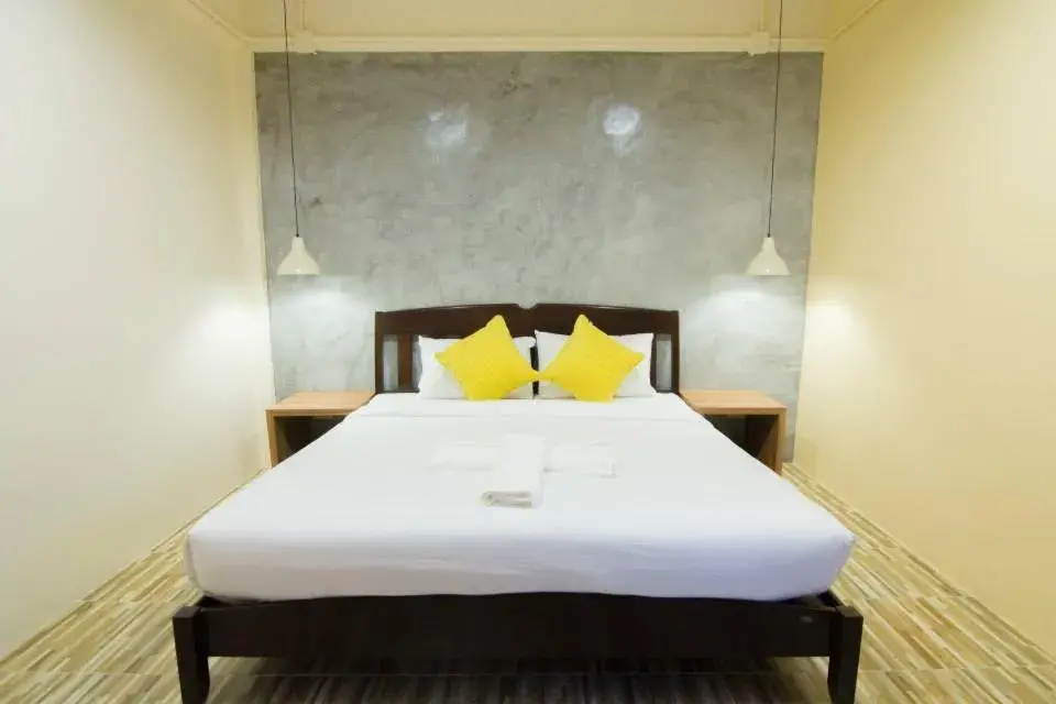 Bed in K.L. Boutique Hotel