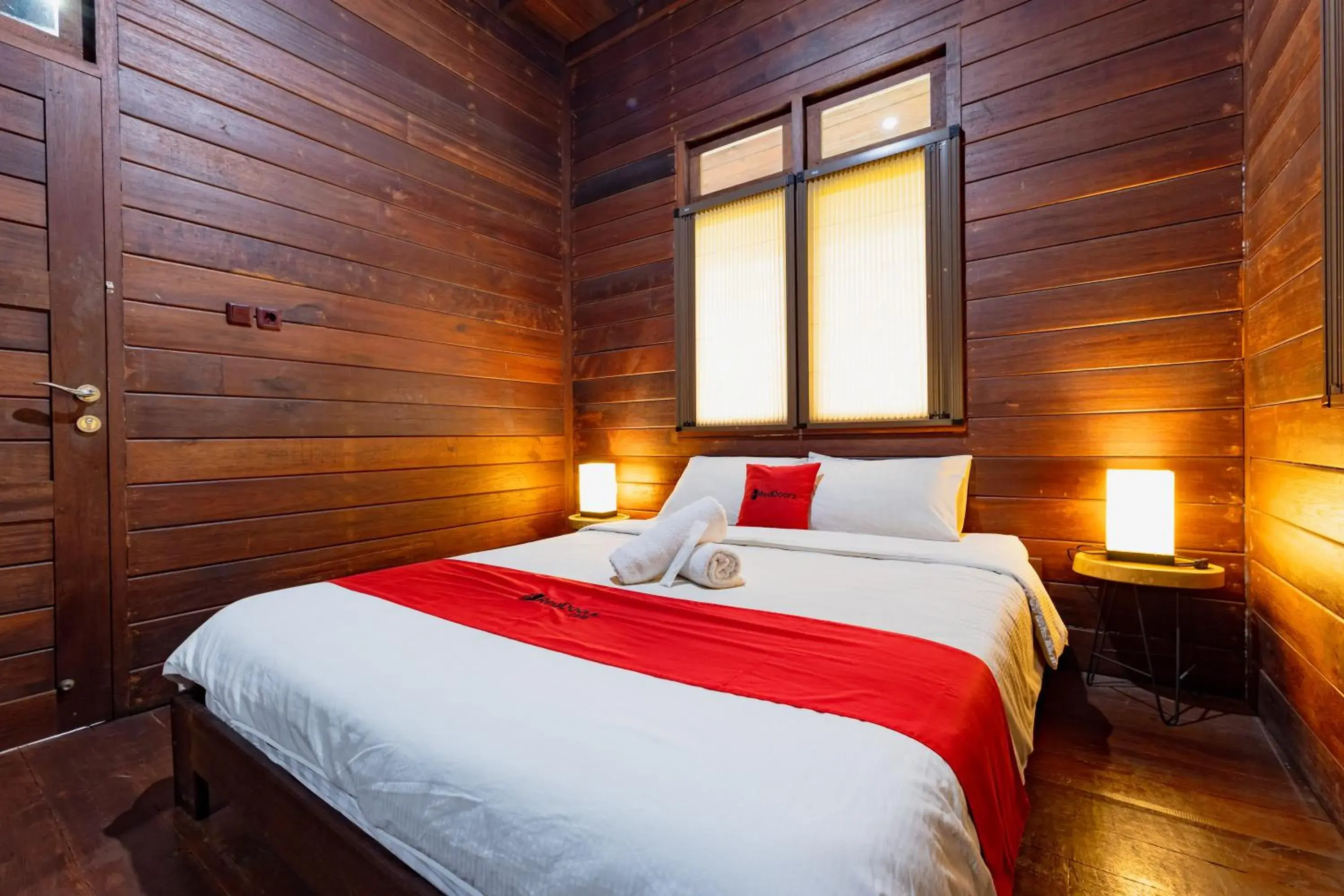 Bedroom, Bed in RedDoorz Resort @ Taman Wisata Mangrove