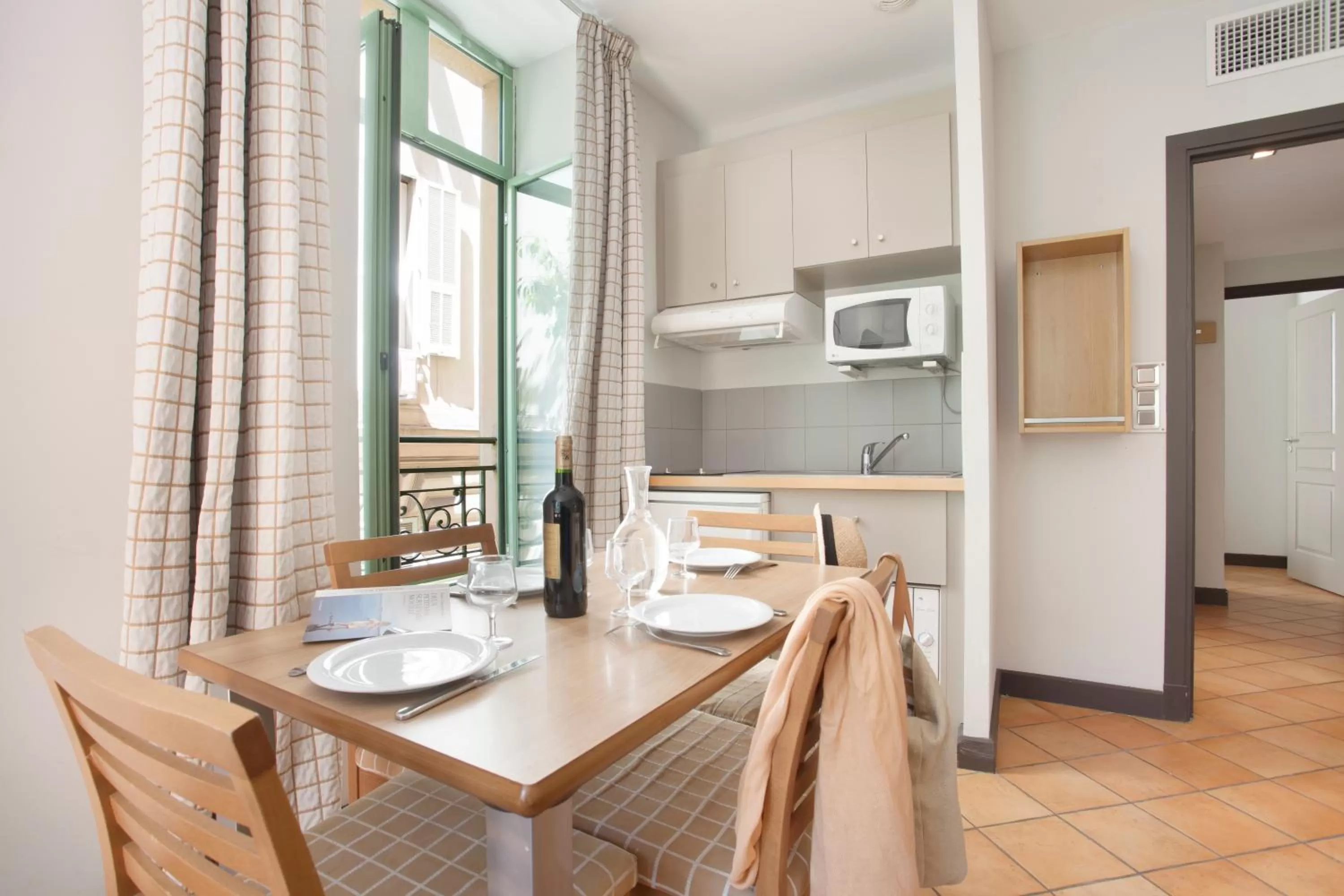 Kitchen or kitchenette in Appart'hôtel Odalys City - Nice Centre