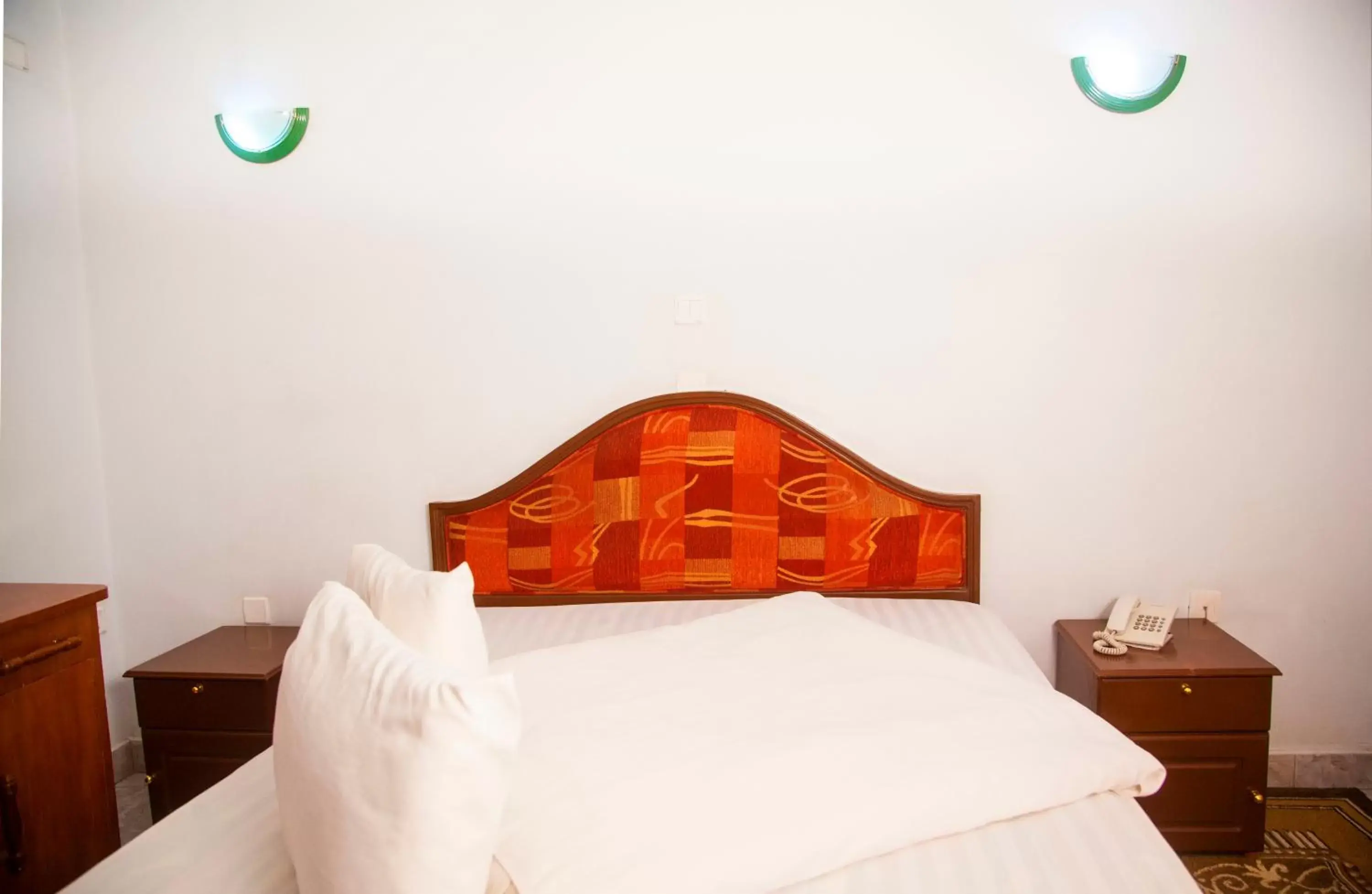 Bed in Natron Palace Hotel