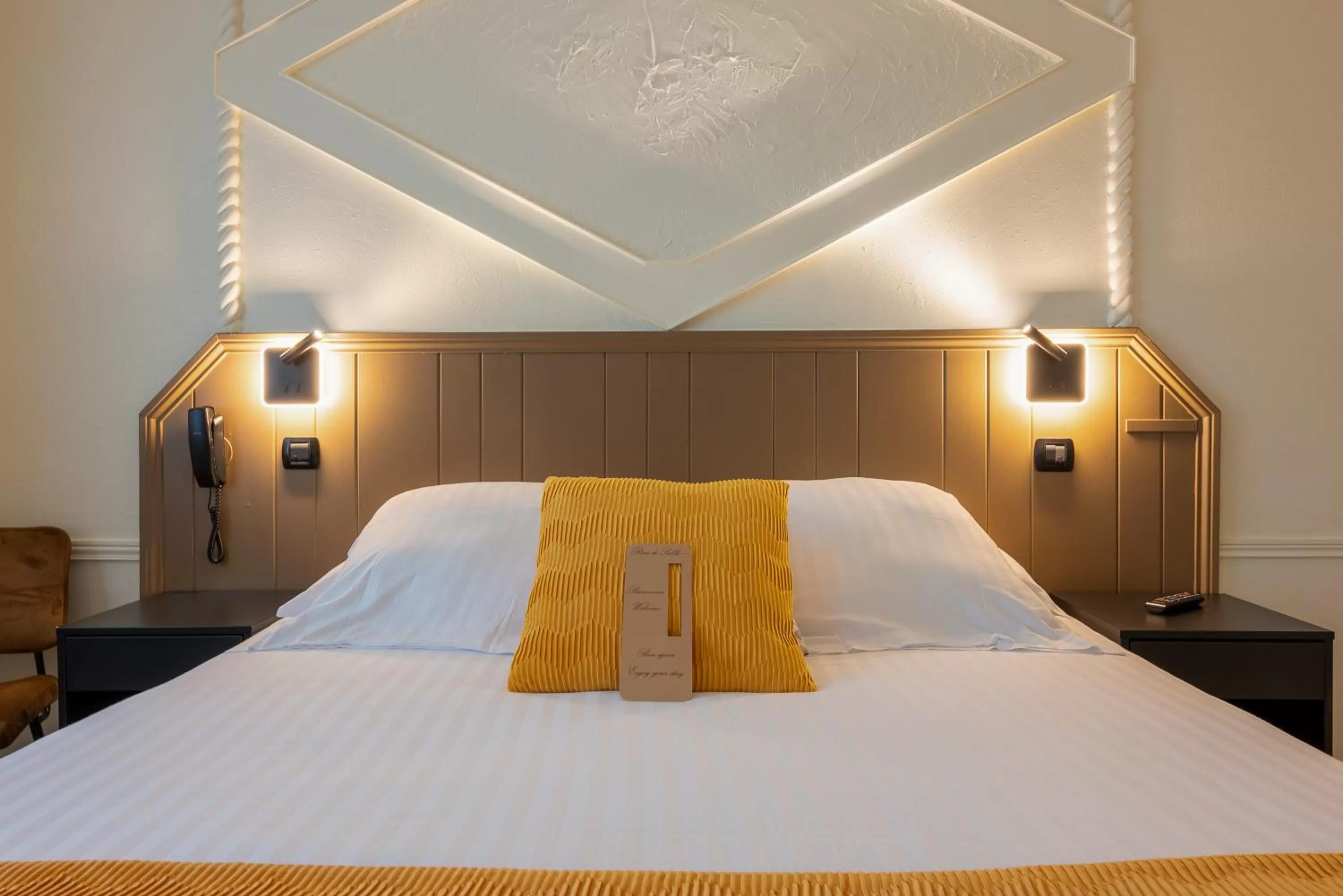 Bed in Logis Hôtel Rêve de Sable