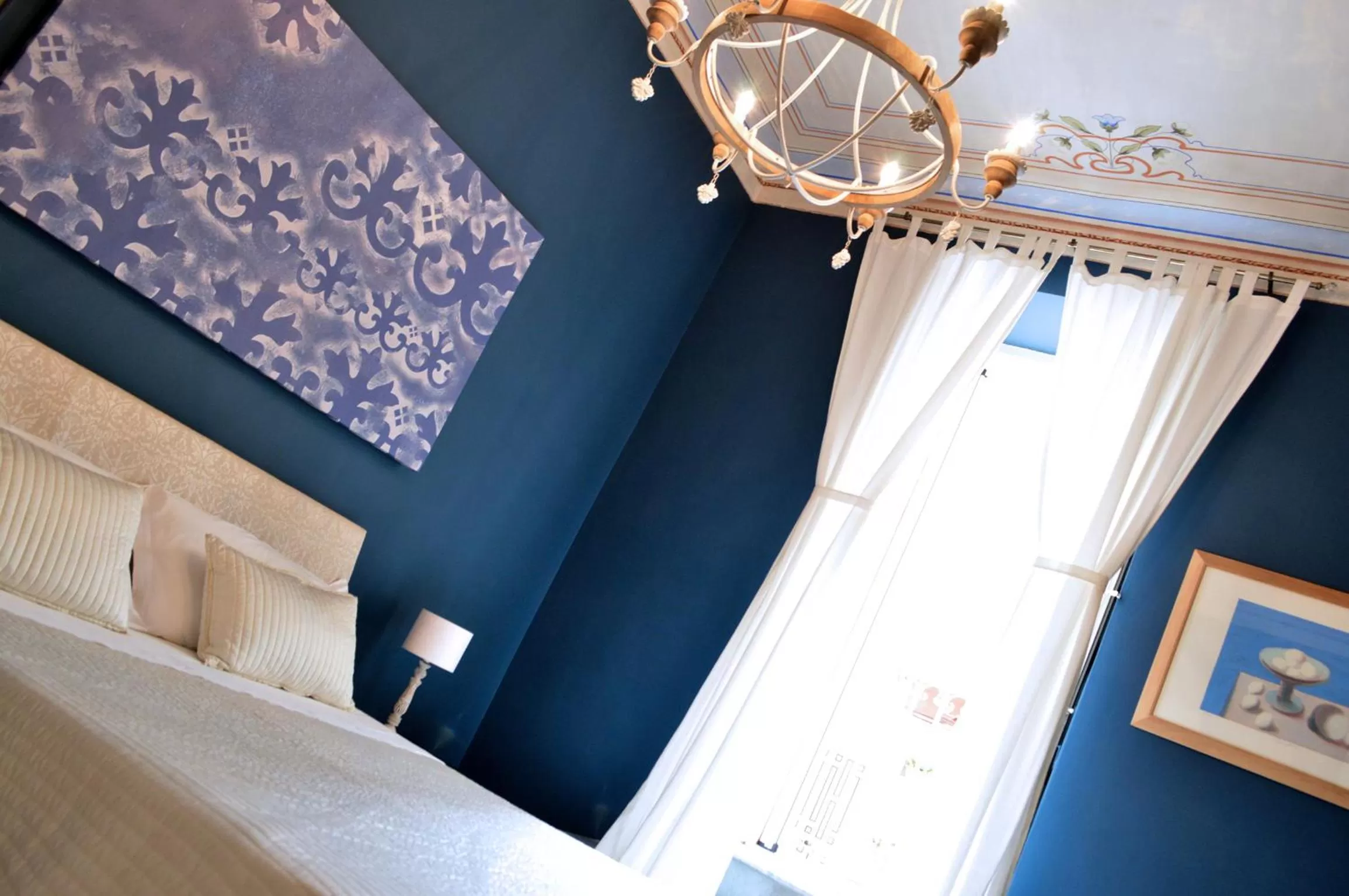 Decorative detail, Bed in Albergo Diffuso Dimora Rossi B&B