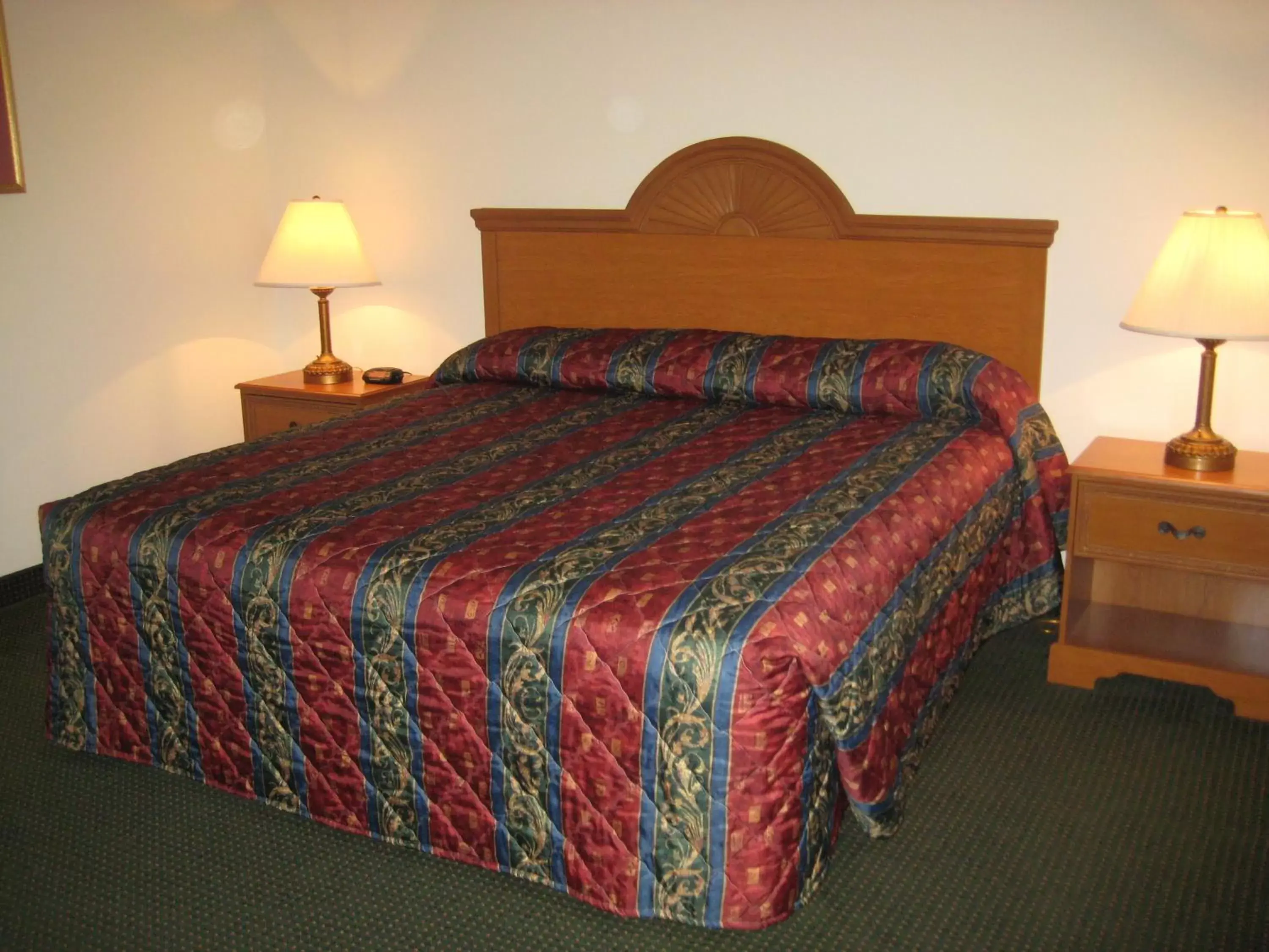 Bed in Horizon Inn & Suites