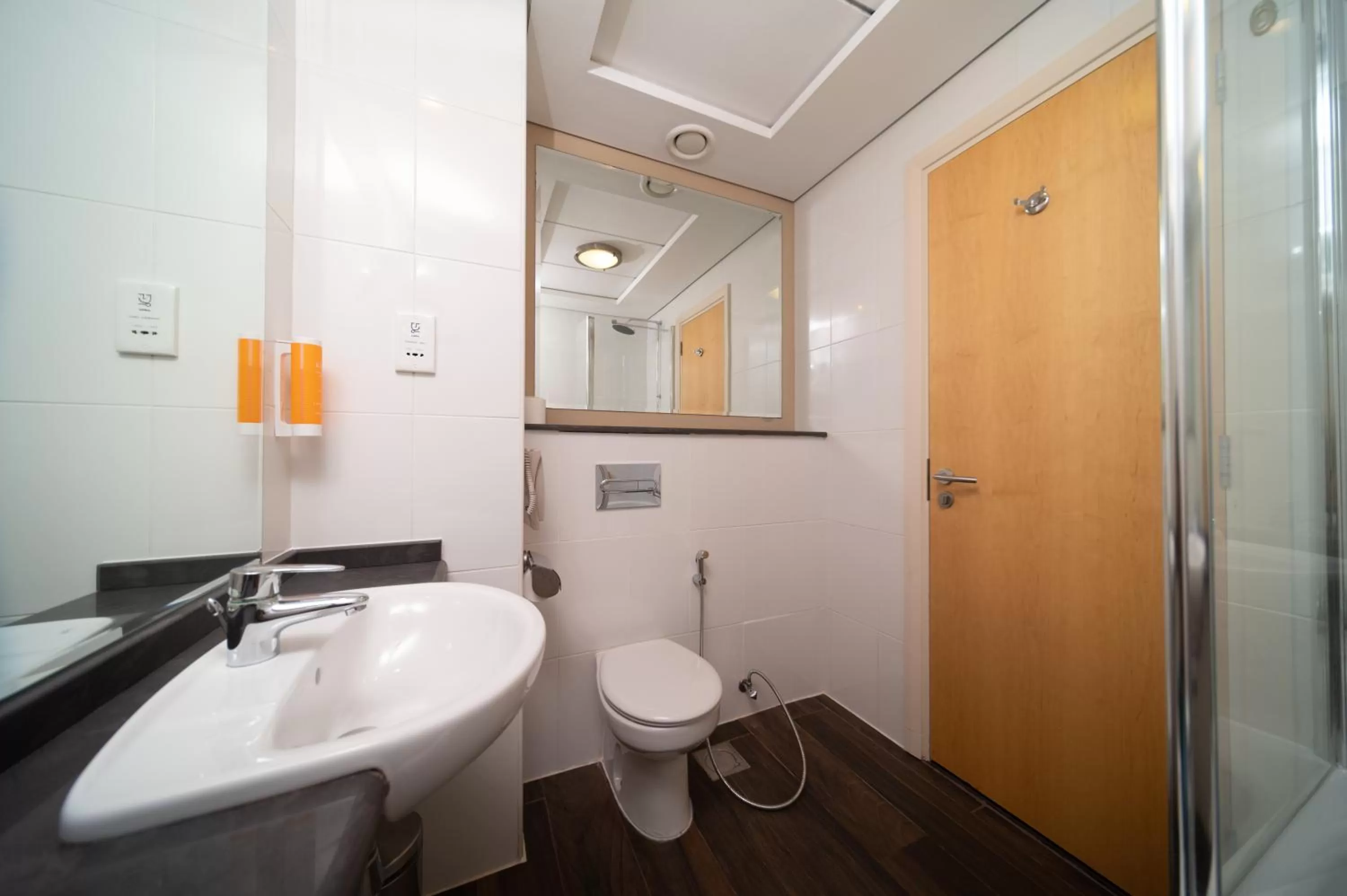Toilet in Premier Inn Dubai Investments Park - An Emirates Group Company