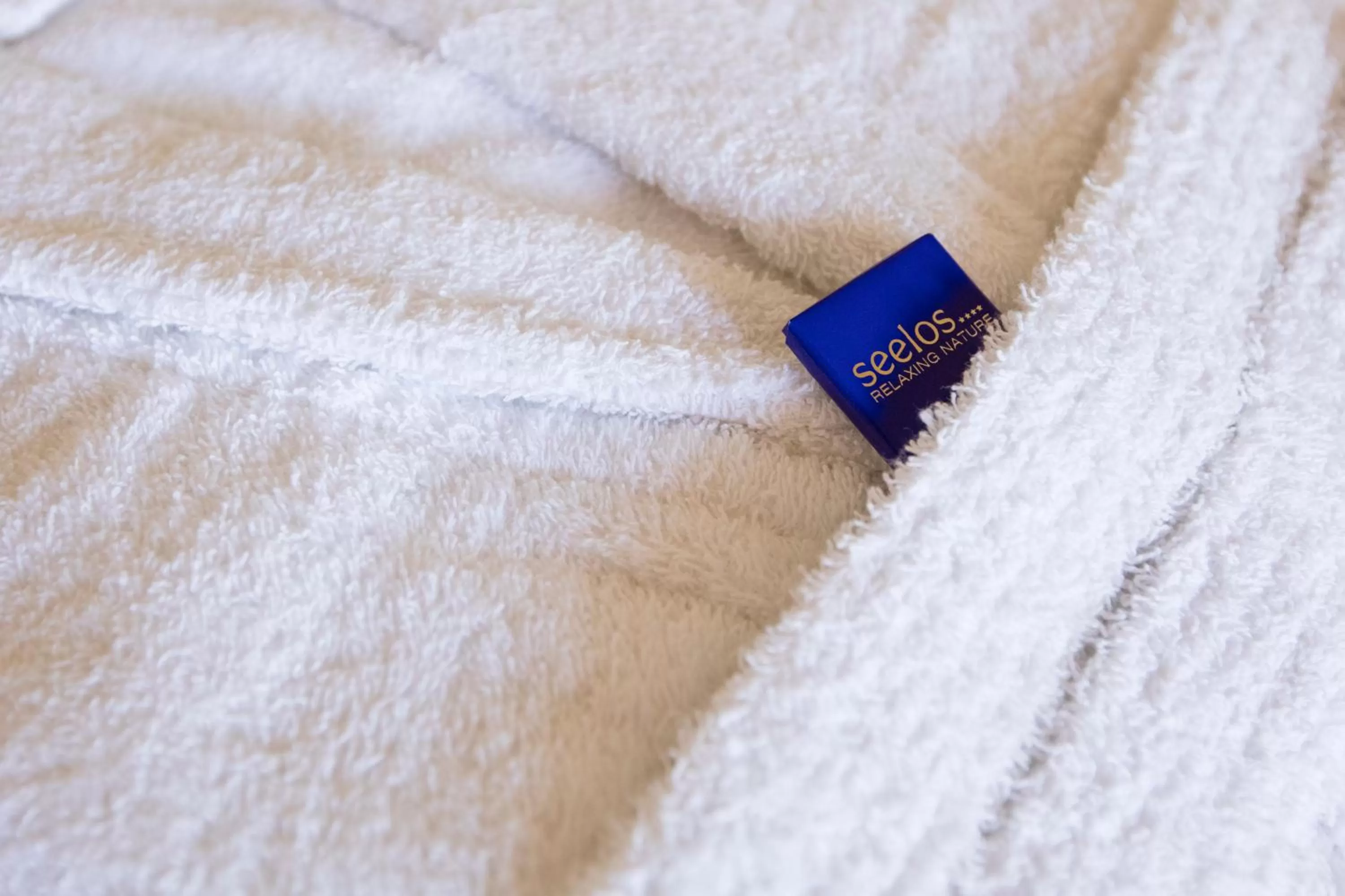 Property logo or sign, Bed in Hotel Seelos