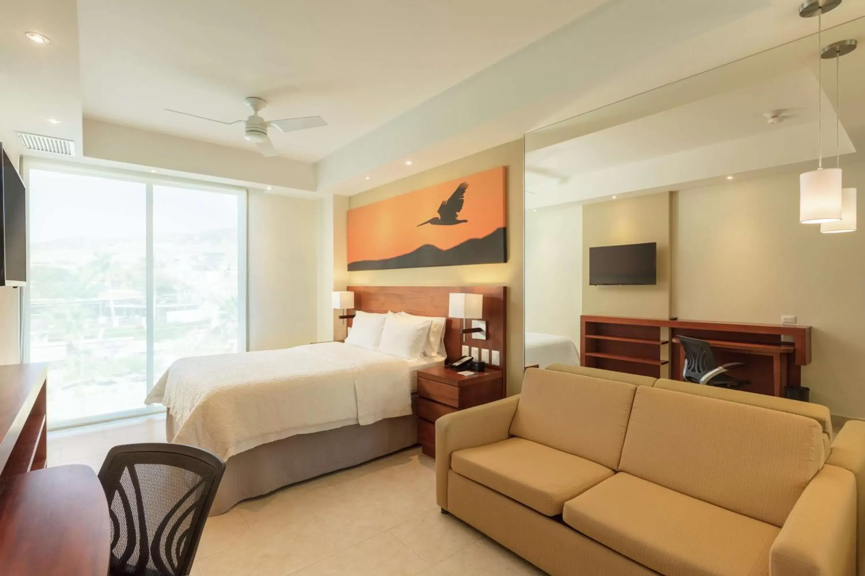 Bedroom, Bed in Hampton Inn & Suites by Hilton Los Cabos Bedroom, Bed in Hampton Inn & Suites by Hilton Los Cabos